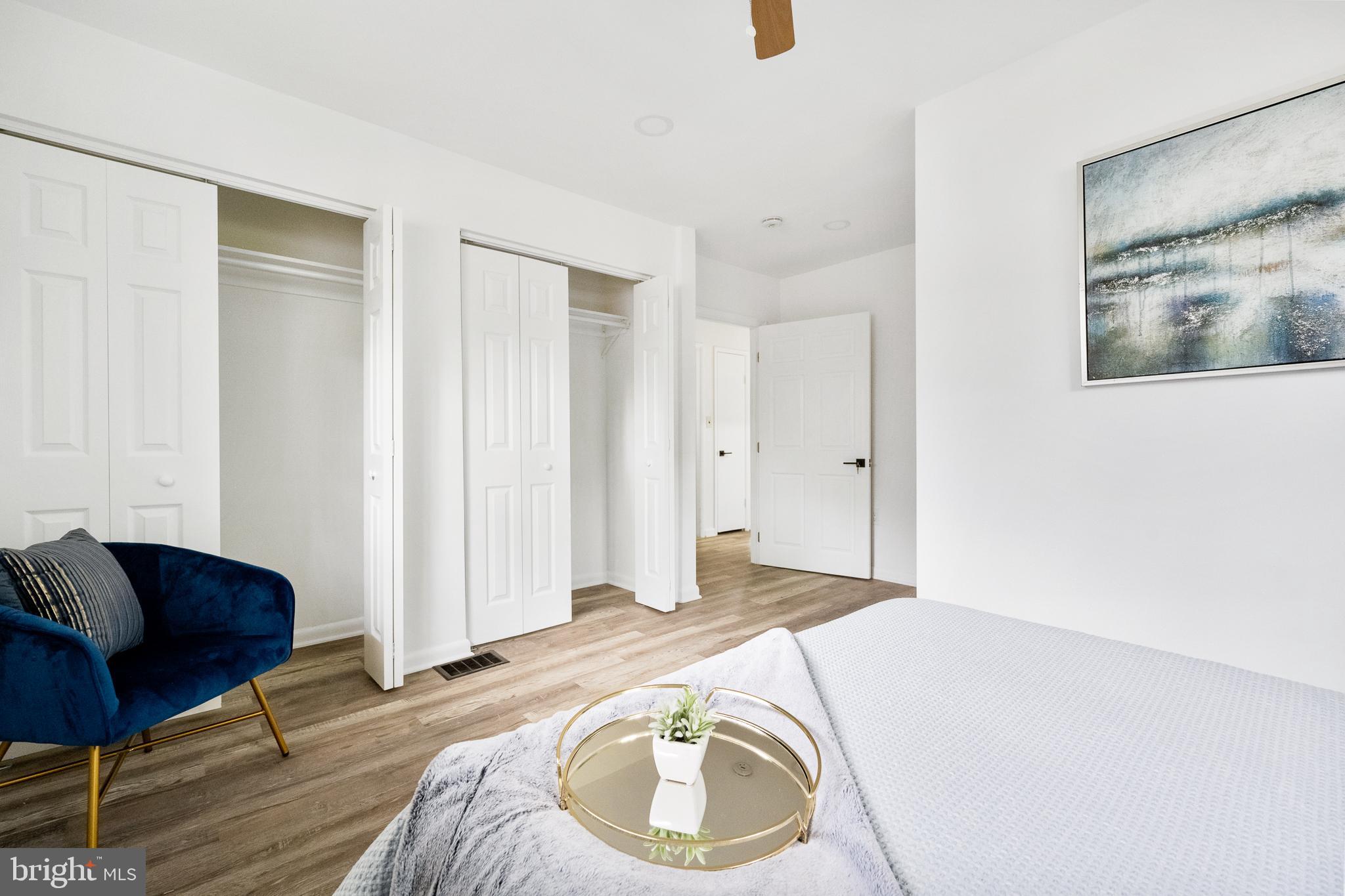 6907 Kipling Parkway District Heights, MD 20747 - Photo 21 of 39 a bedroom with a bed and chair