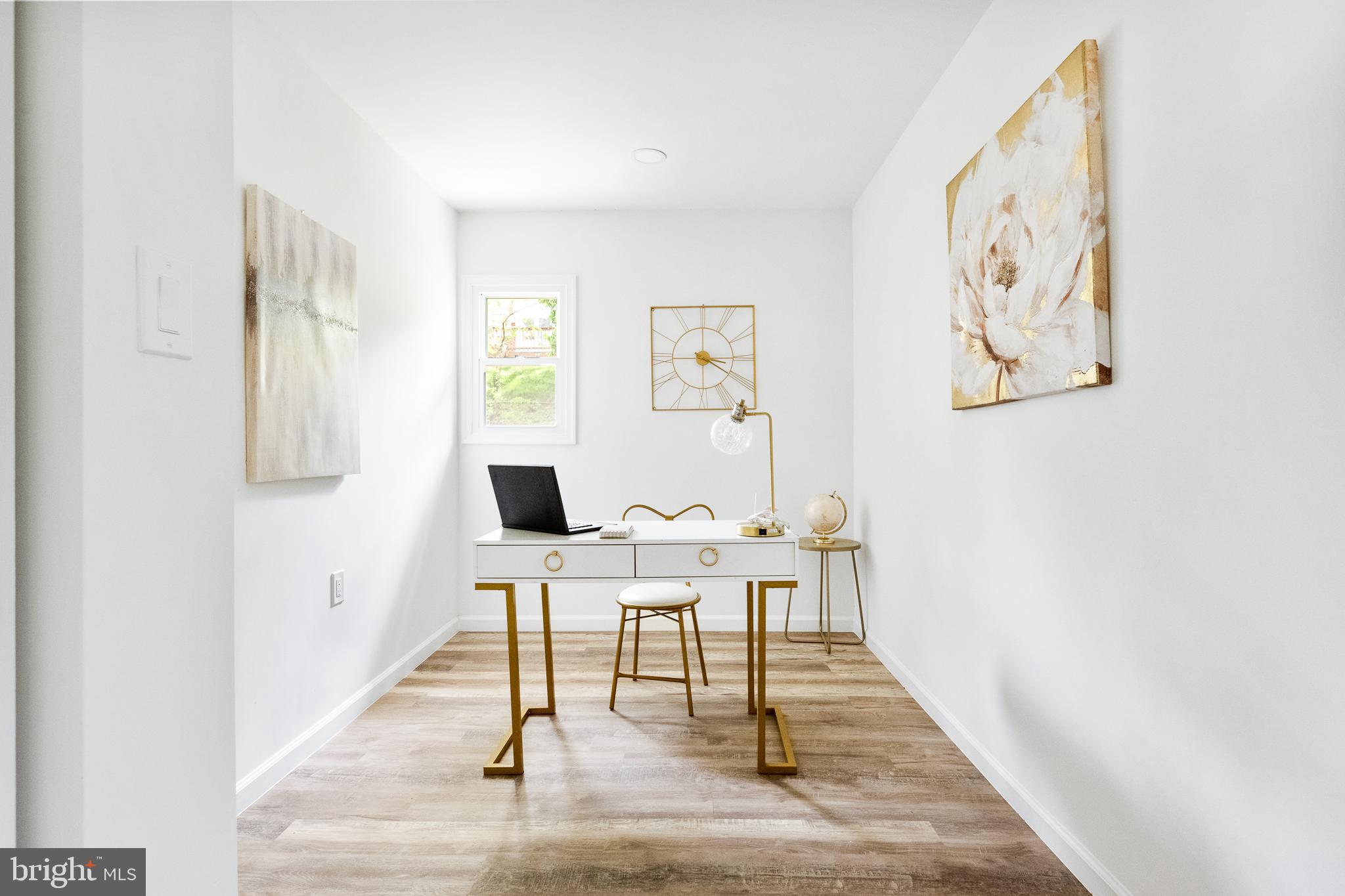 6907 Kipling Parkway District Heights, MD 20747 - Photo 23 of 39 a view of a workspace with wooden floor and a workspace