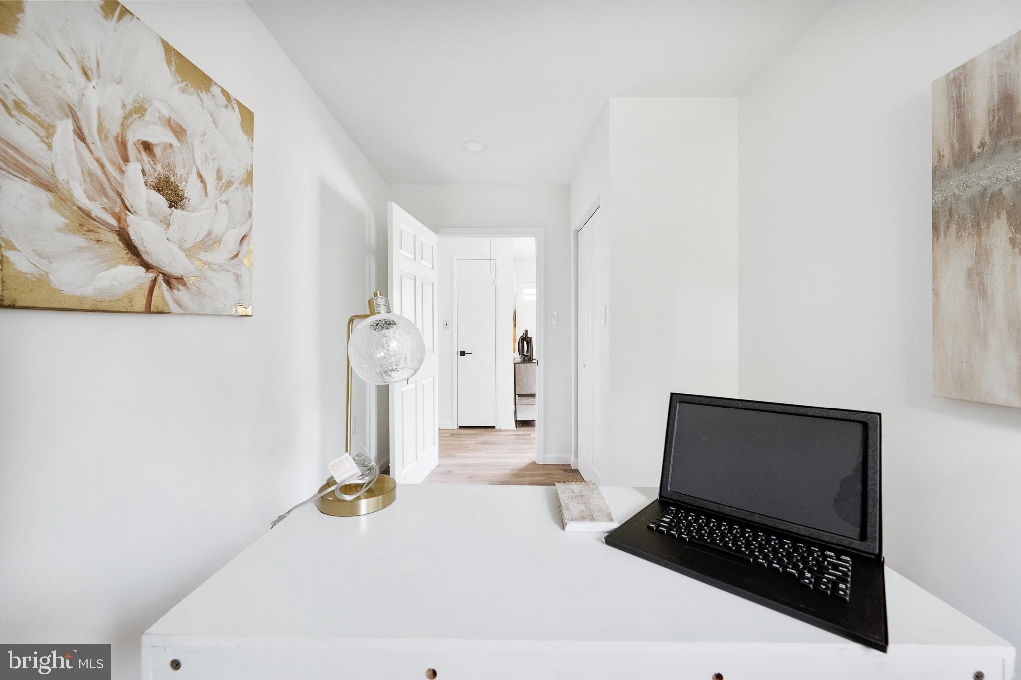 6907 Kipling Parkway District Heights, MD 20747 - Photo 24 of 39 a bathroom with a sink and a mirror