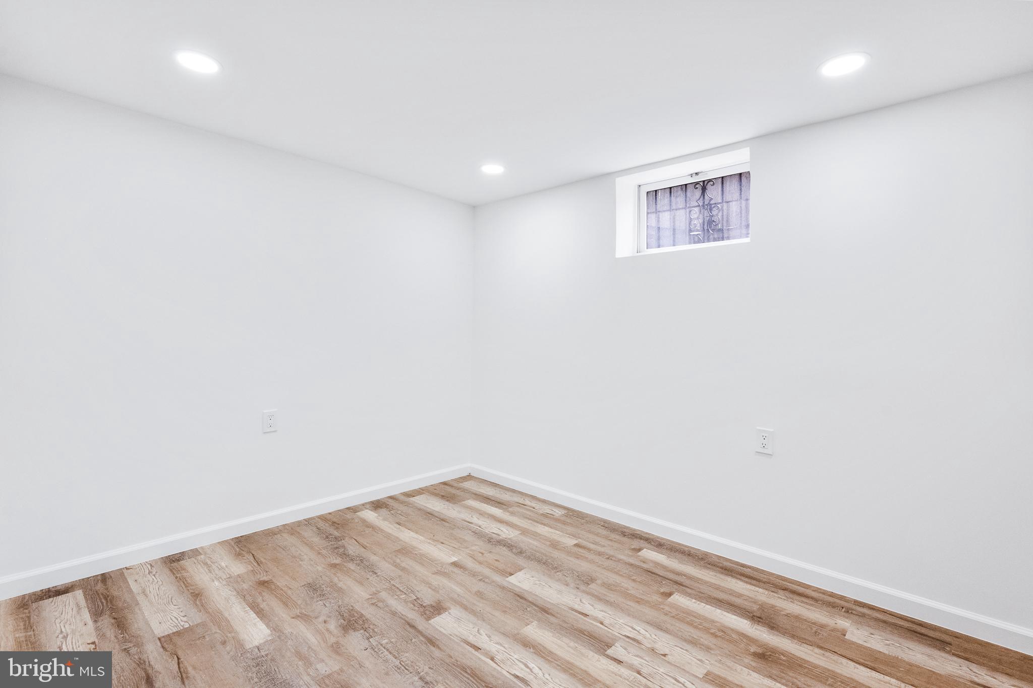 6907 Kipling Parkway District Heights, MD 20747 - Photo 31 of 39 a view of room with wooden floor and fan