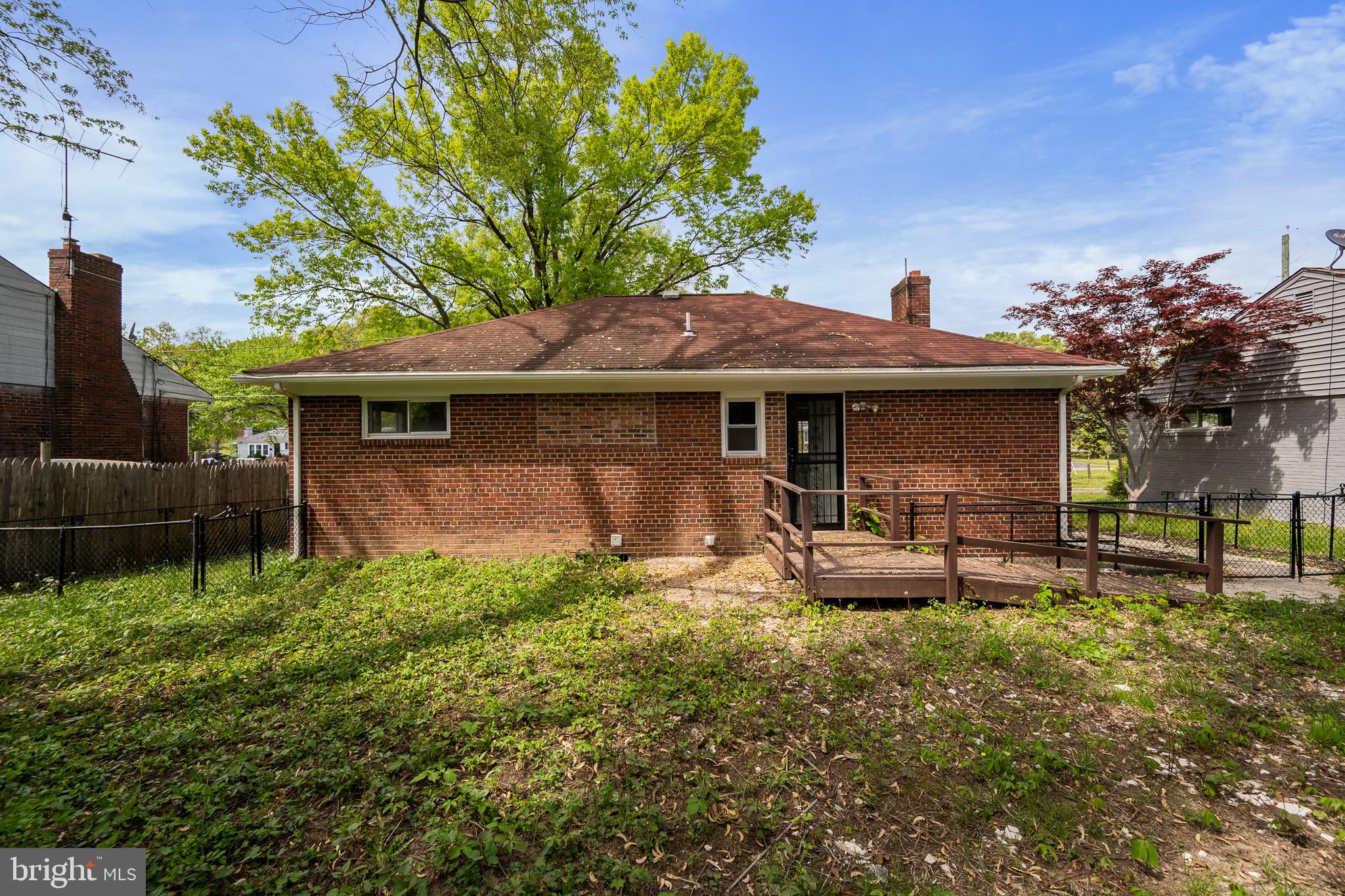6907 Kipling Parkway District Heights, MD 20747 - Photo 39 of 39 a front view of a house with garden