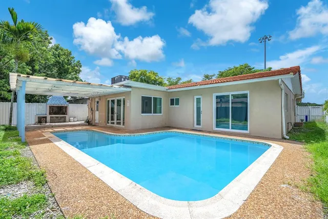 a view of outdoor space yard swimming pool and porch