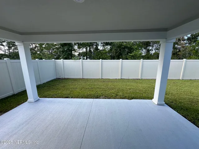 a view of a backyard with garden