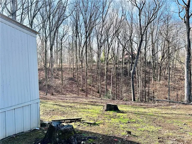 a view of swimming pool with a yard
