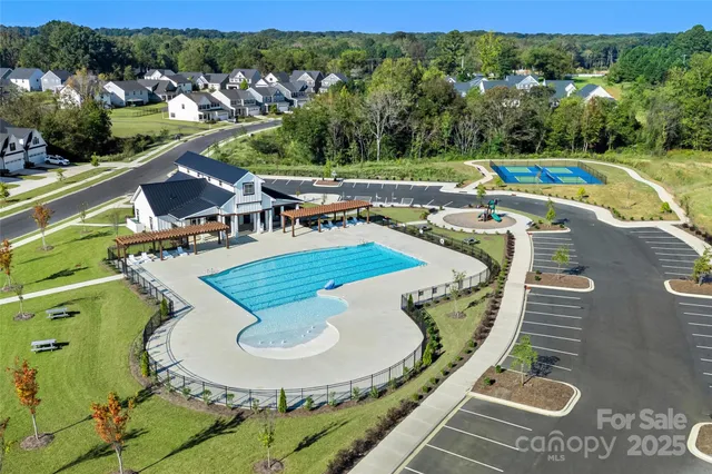 a view of a swimming pool with a patio