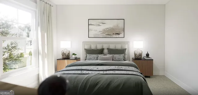 a bedroom with a bed and a painting on the wall