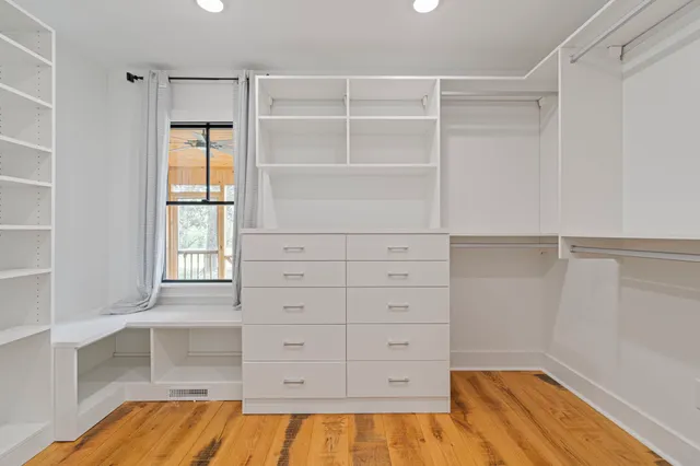 a view of an empty walk in closet