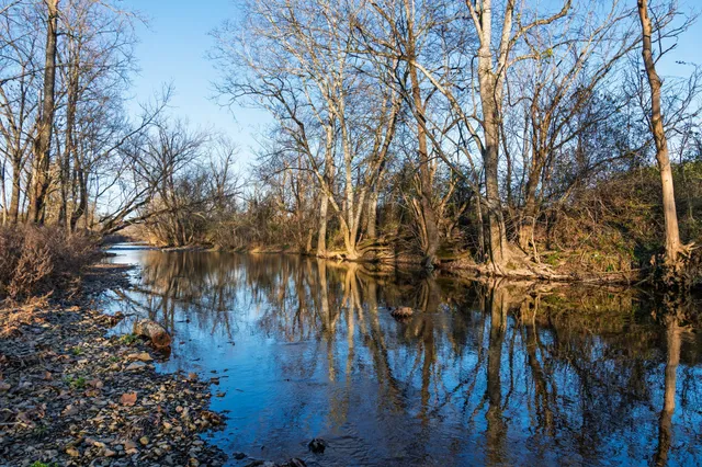 a view of a lake with a mountain