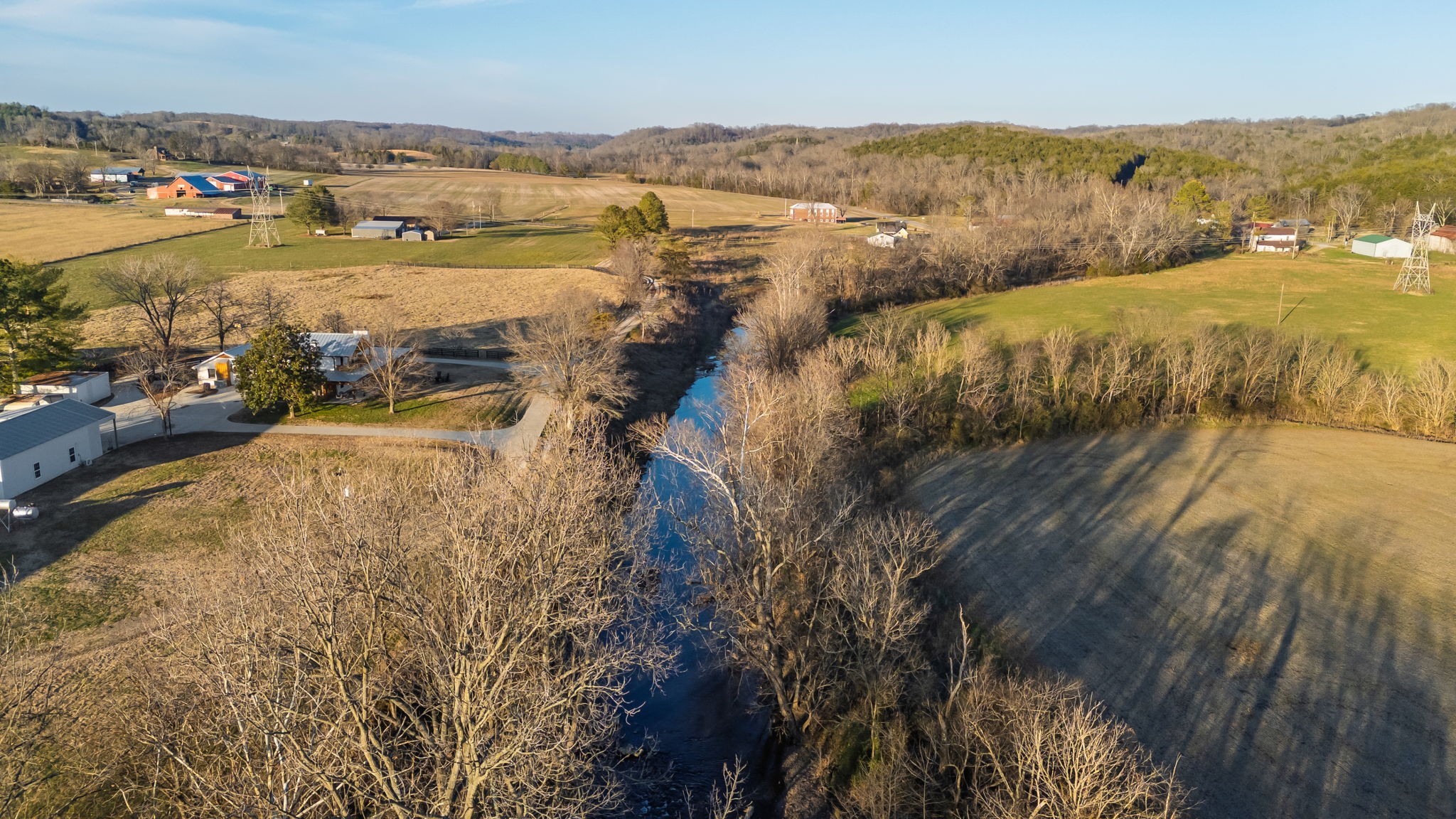 4824 Leipers Creek Road Williamsport, TN 38487 - Photo 10 of 34 a view of a lake with mountains in the background