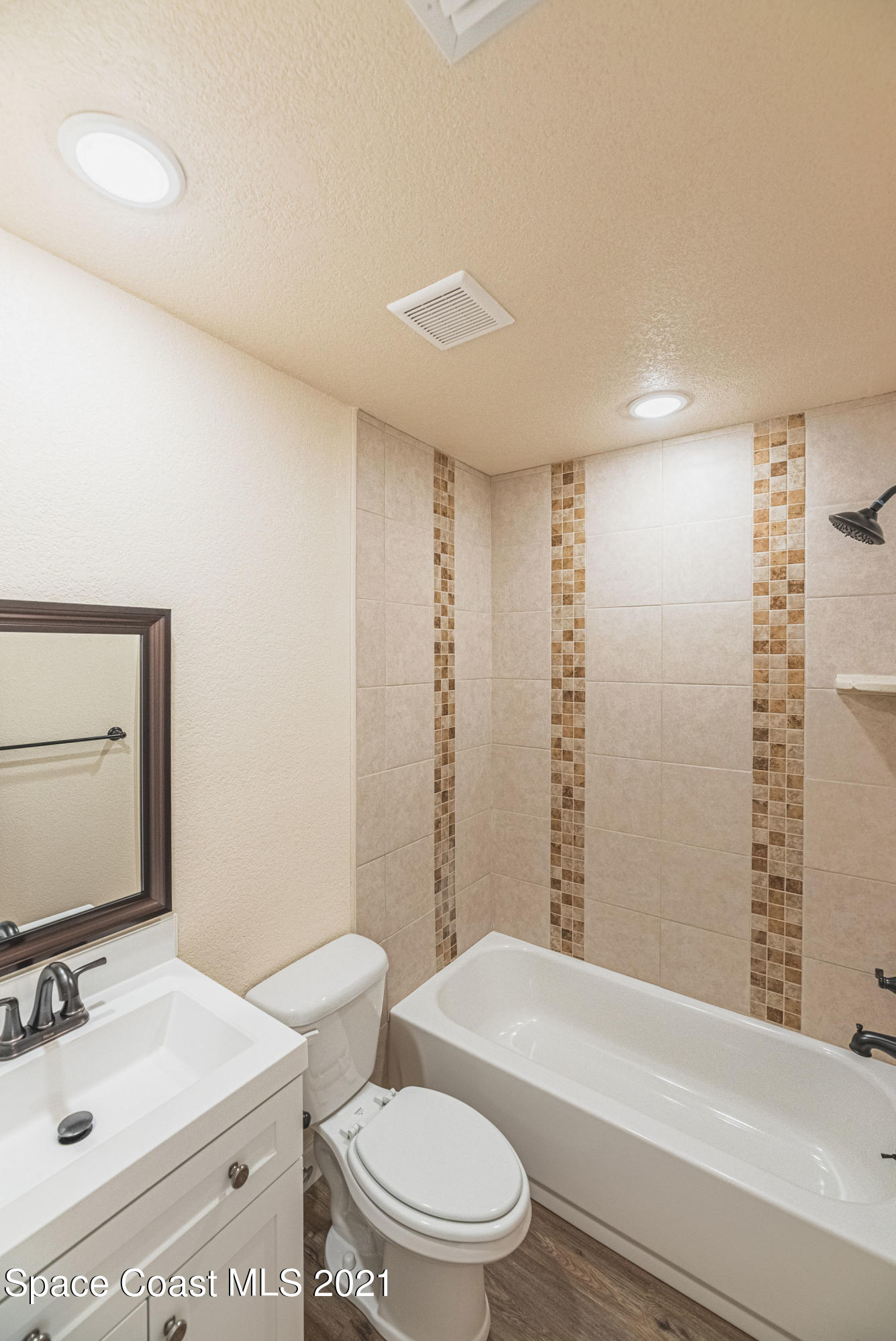 765 Garvey Road Palm Bay, FL 32908 - Photo 40 of 81 a bathroom with a sink a toilet and shower