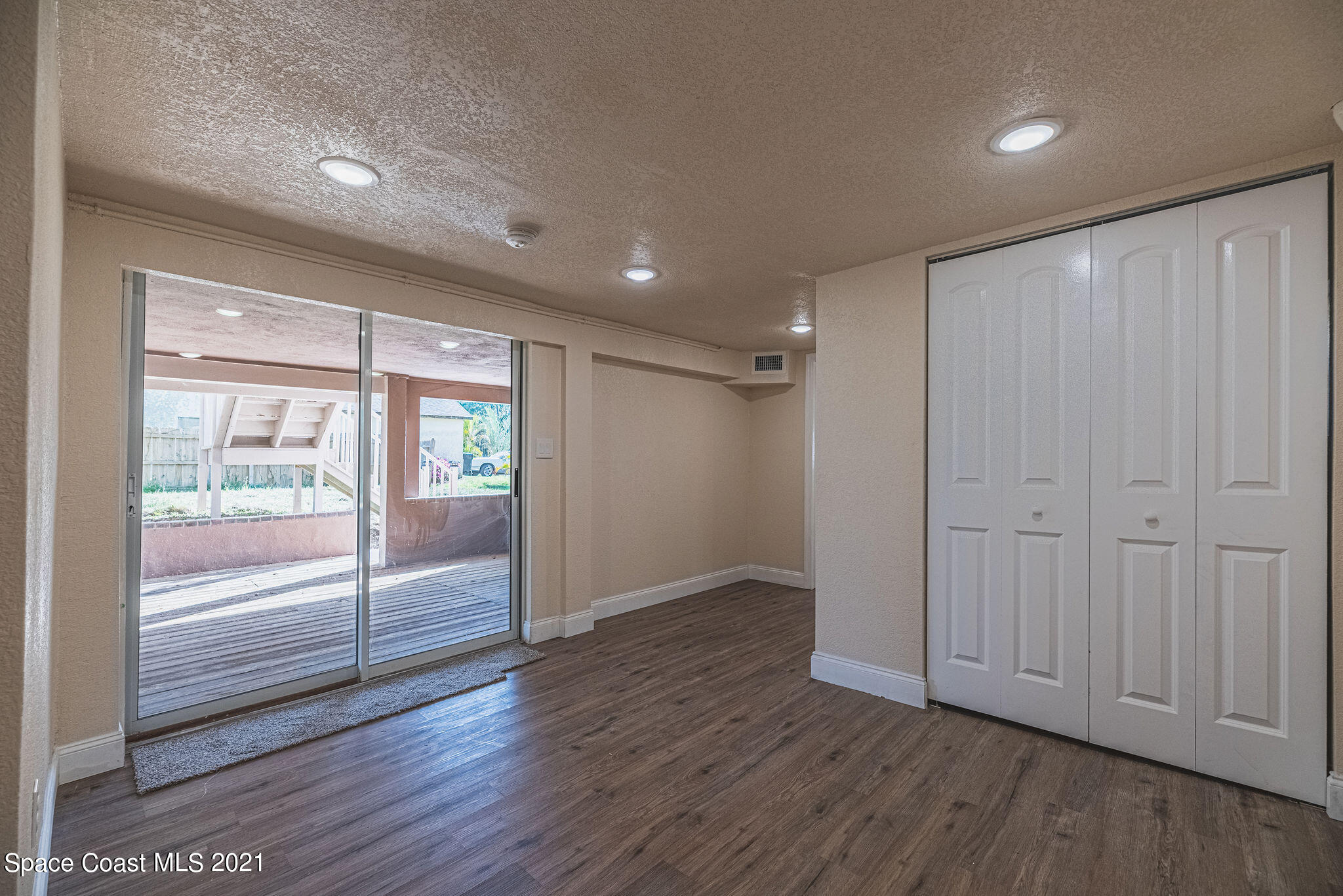 765 Garvey Road Palm Bay, FL 32908 - Photo 48 of 81 a view of entryway with wooden floor