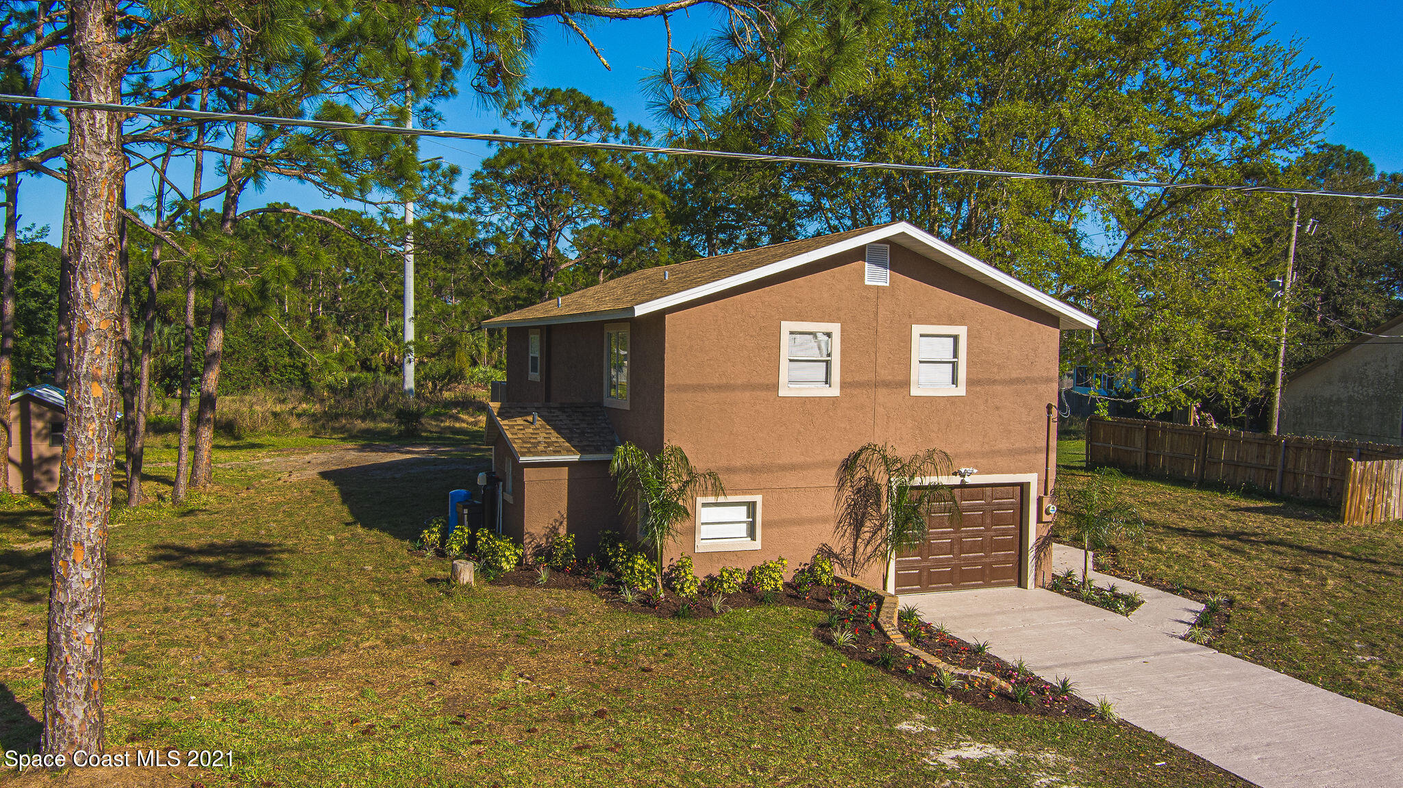 765 Garvey Road Palm Bay, FL 32908 - Photo 6 of 81 a view of outdoor space and yard