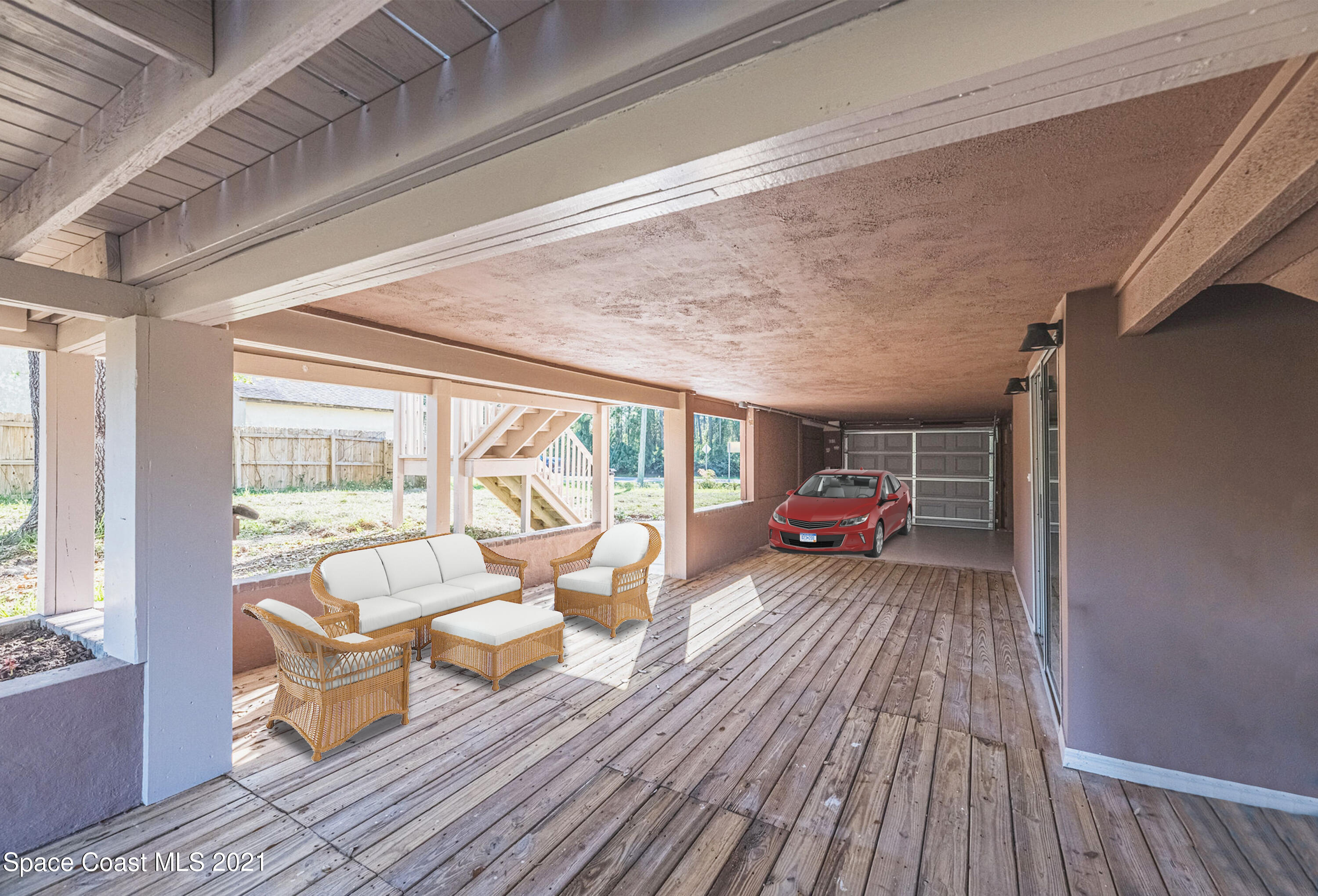 765 Garvey Road Palm Bay, FL 32908 - Photo 61 of 81 a view of a house with wooden floor and outdoor seating