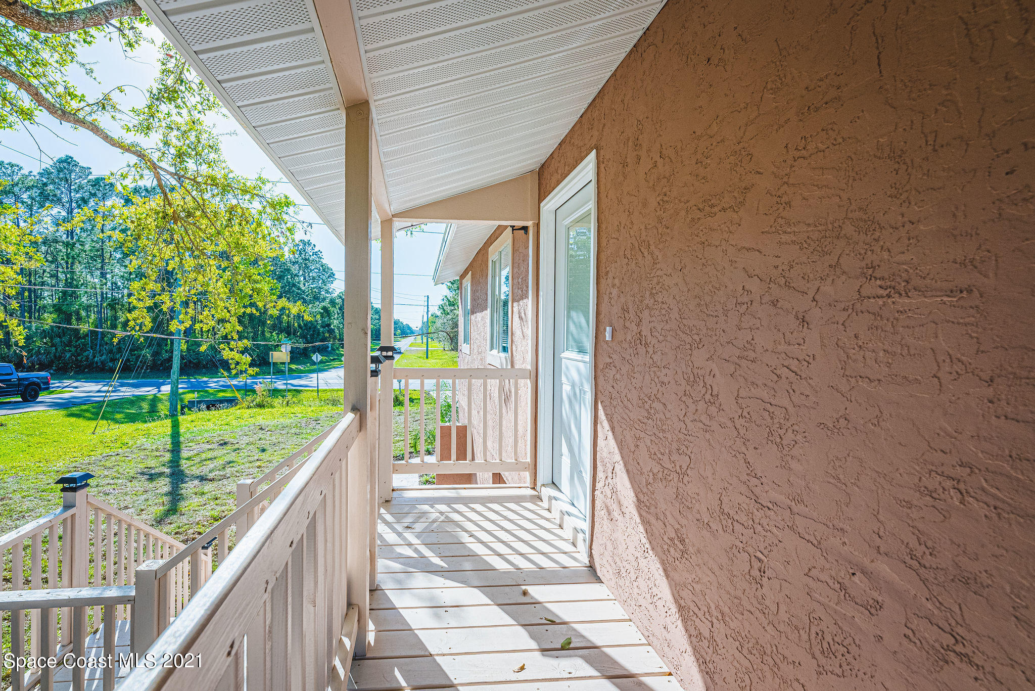 765 Garvey Road Palm Bay, FL 32908 - Photo 63 of 81 Front door to deck