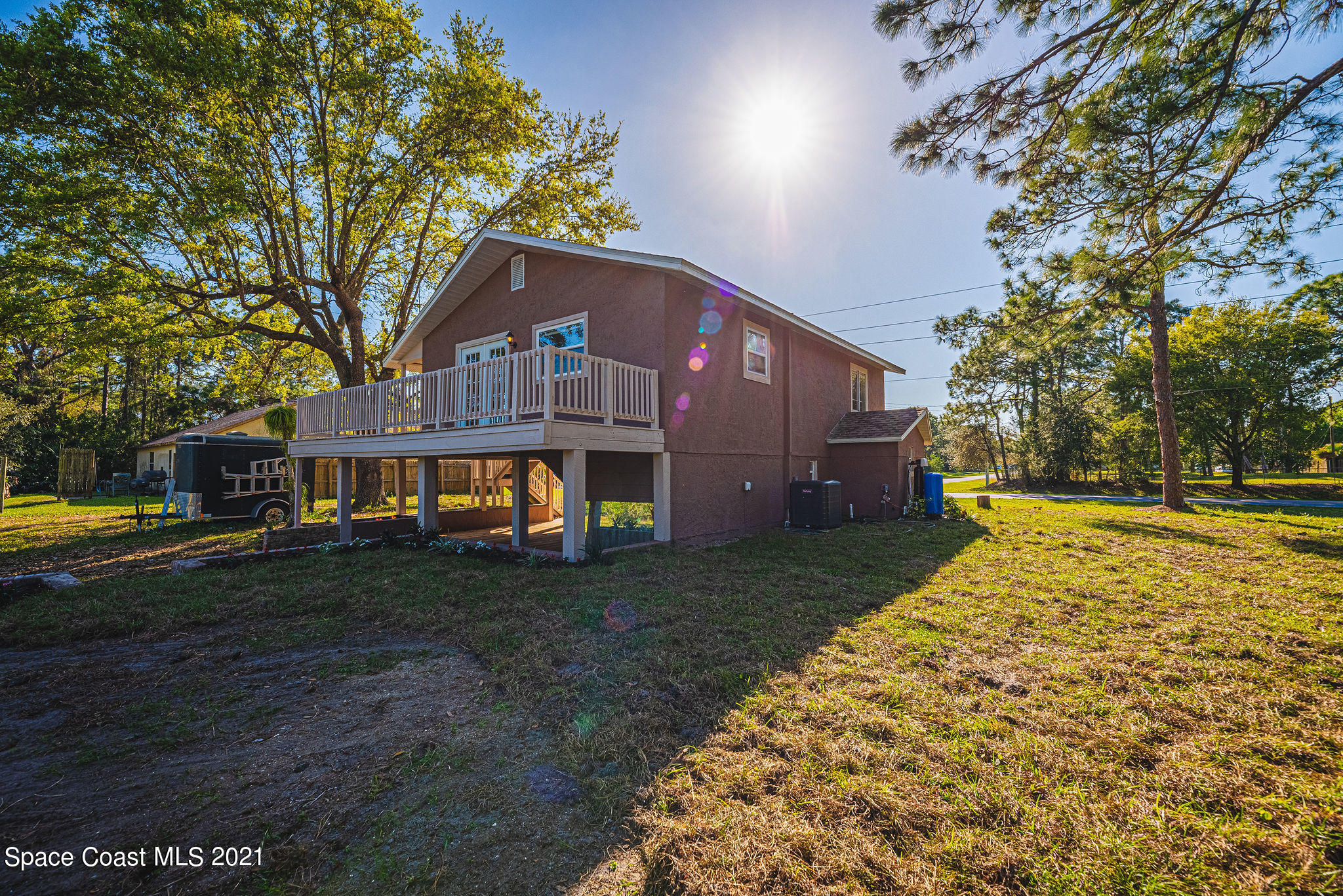 765 Garvey Road Palm Bay, FL 32908 - Photo 70 of 81 a house view with a garden space