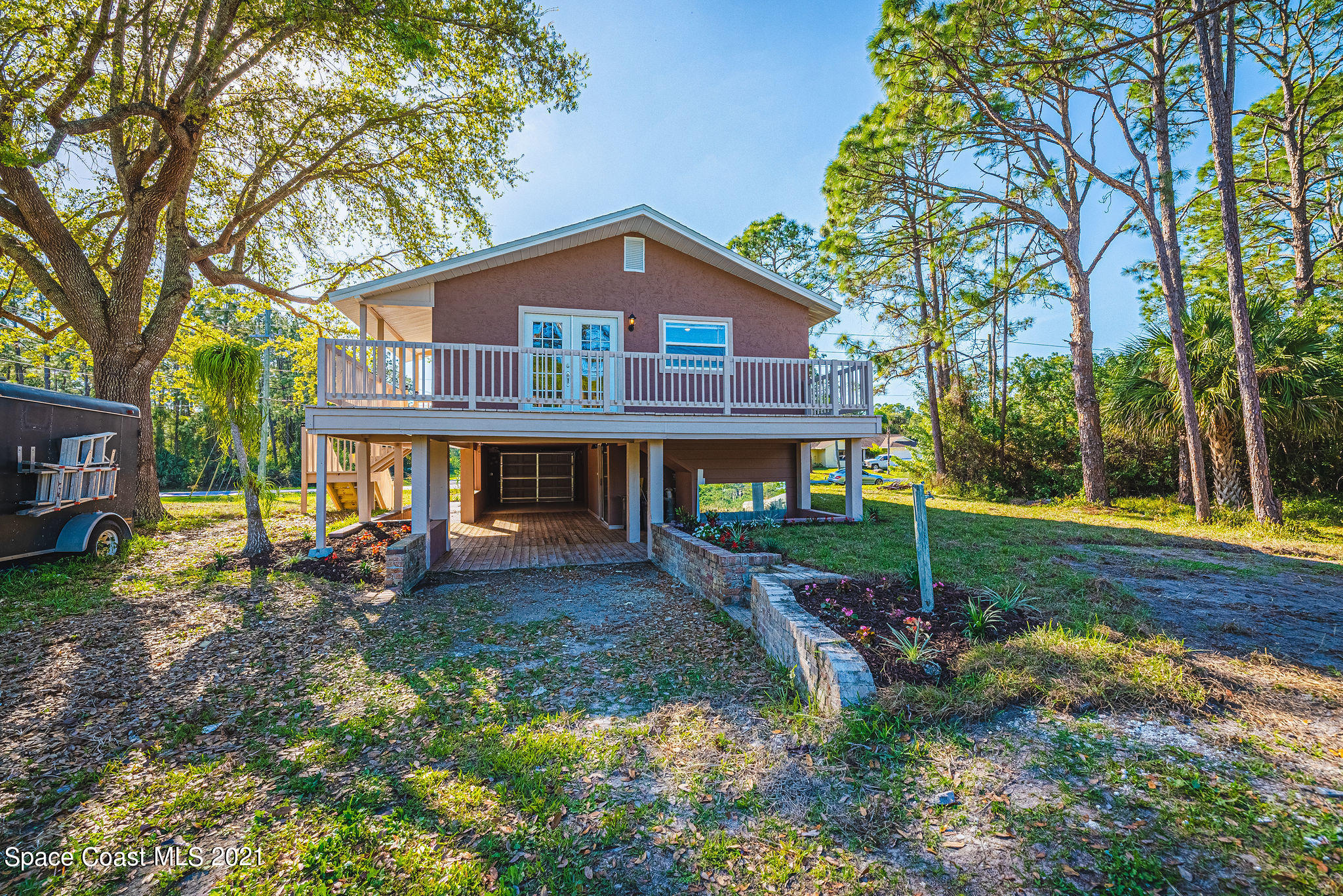 765 Garvey Road Palm Bay, FL 32908 - Photo 73 of 81 a view of a house with a yard