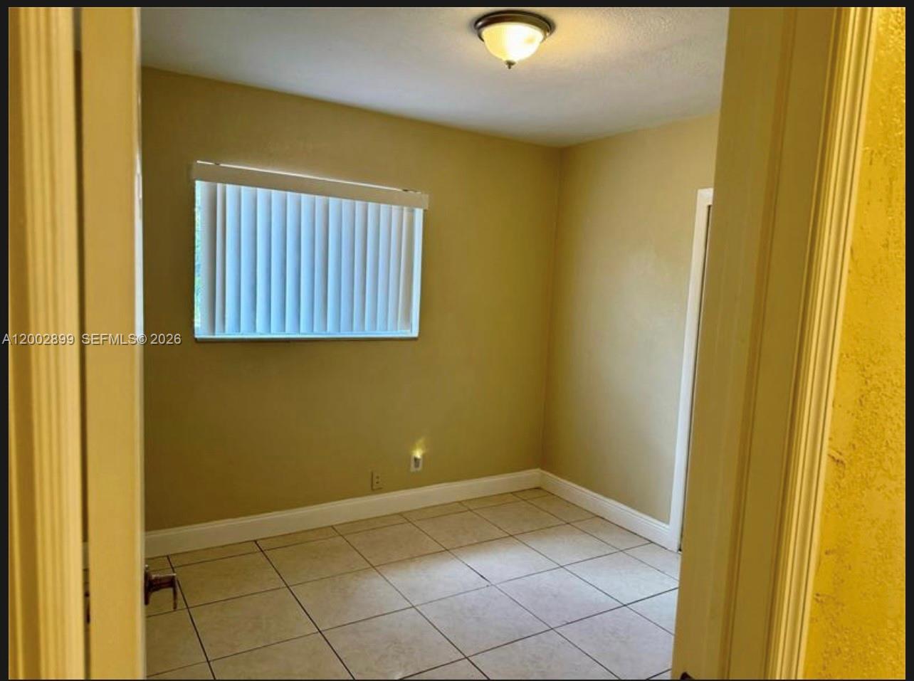 6471 Southwest 27th Street, Unit 1 & 2 Miramar, FL 33023 - Photo 12 of 29 a view of a room with a window