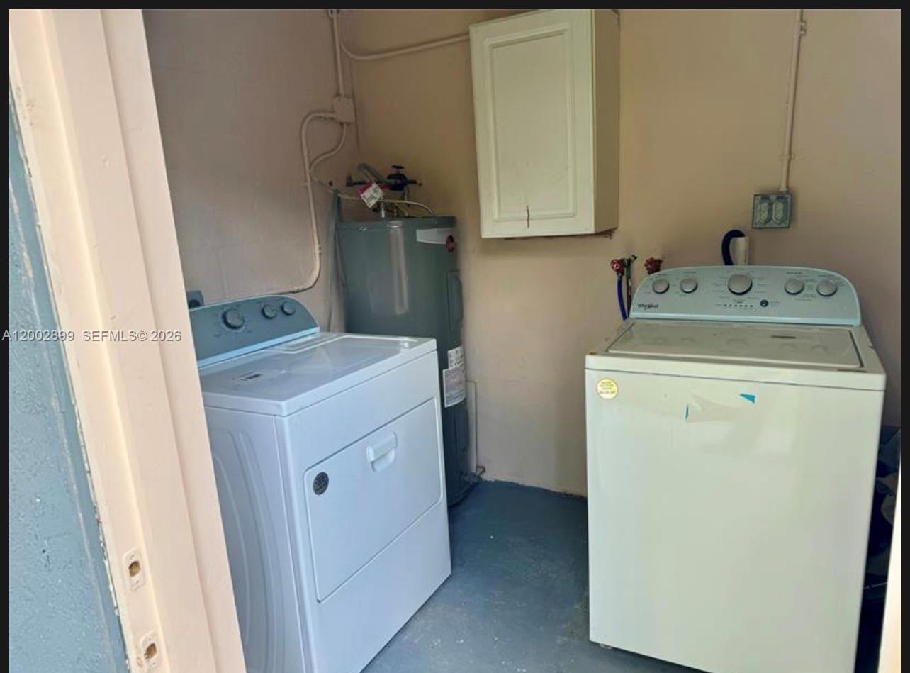 6471 Southwest 27th Street, Unit 1 & 2 Miramar, FL 33023 - Photo 16 of 29 a utility room with dryer and washer