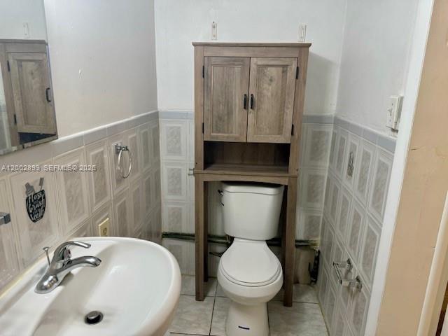 6471 Southwest 27th Street, Unit 1 & 2 Miramar, FL 33023 - Photo 28 of 29 a bathroom with a sink and a toilet