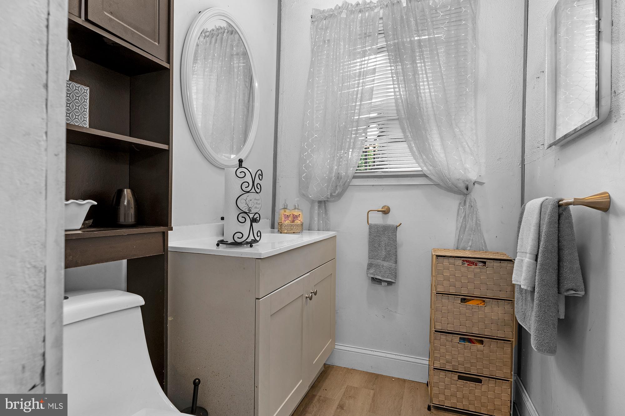 2410 Reisterstown Road Baltimore, MD 21217 - Photo 8 of 16 Half bath on main level