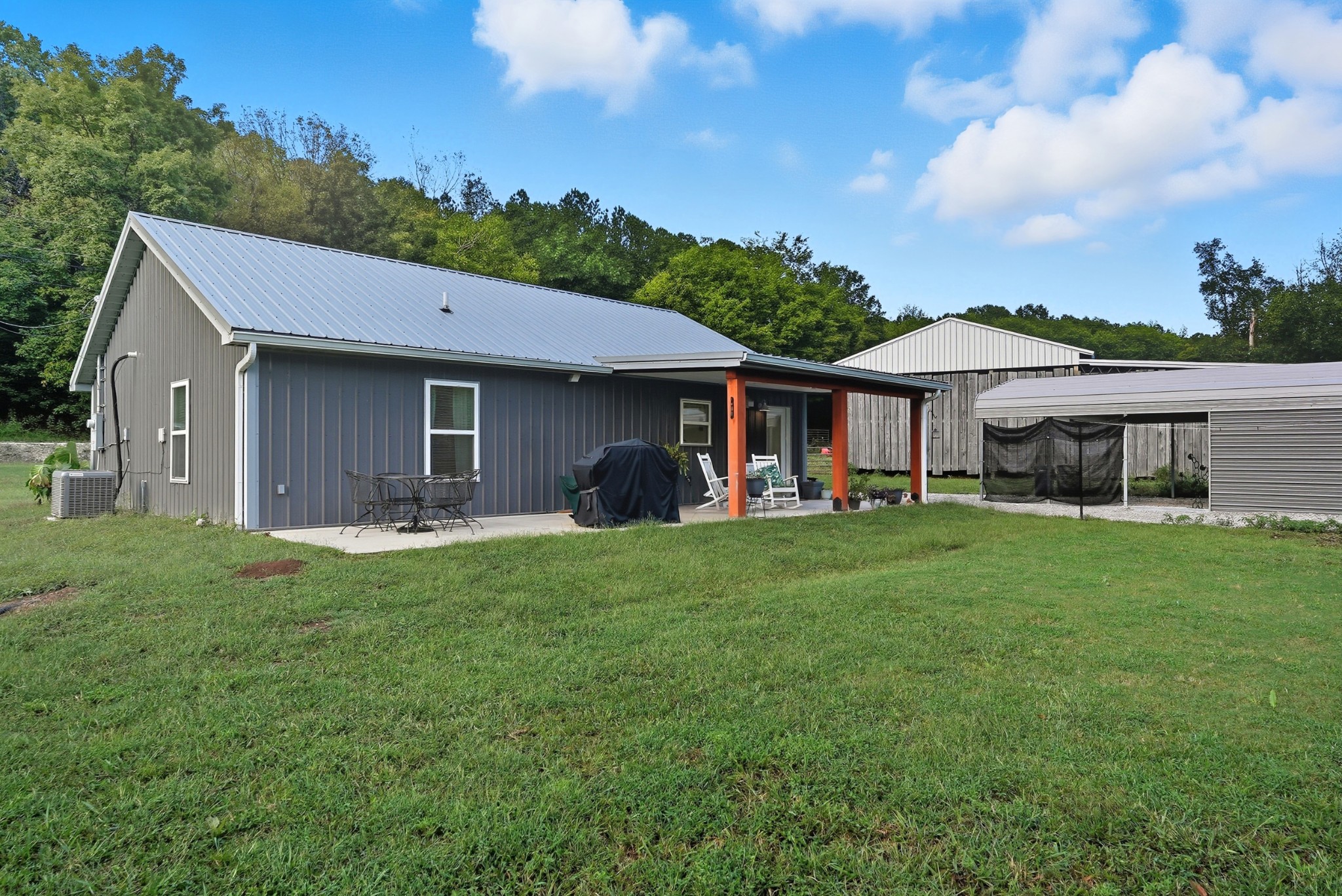 1215 Ennis Branch Road McEwen, TN 37101 - Photo 13 of 36 a front view of a house with a garden