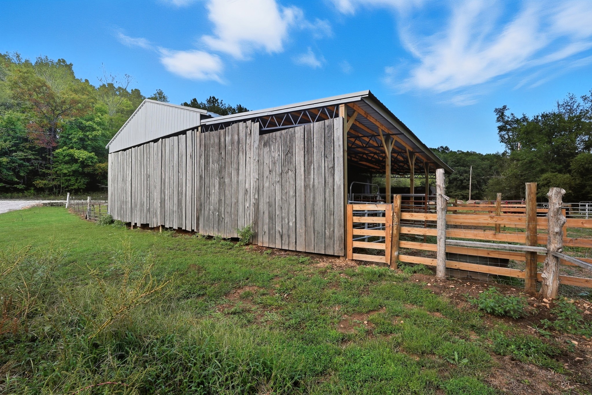 1215 Ennis Branch Road McEwen, TN 37101 - Photo 16 of 36 a view of a backyard with wooden fence