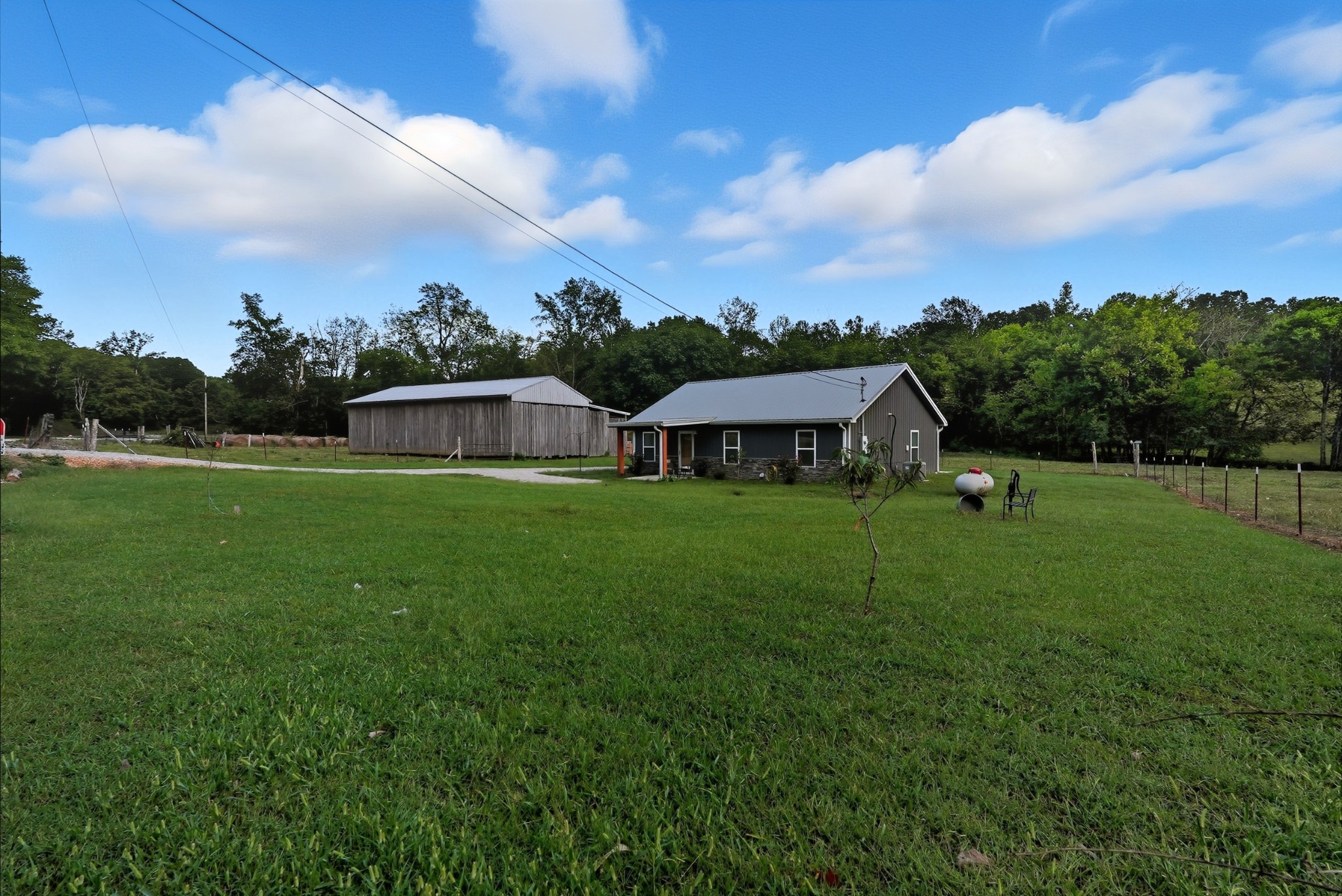 1215 Ennis Branch Road McEwen, TN 37101 - Photo 17 of 36 a house view with a garden space