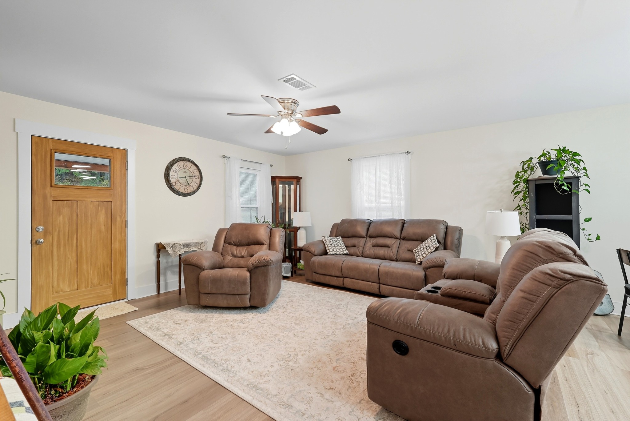 1215 Ennis Branch Road McEwen, TN 37101 - Photo 19 of 36 a living room with furniture and a chandelier