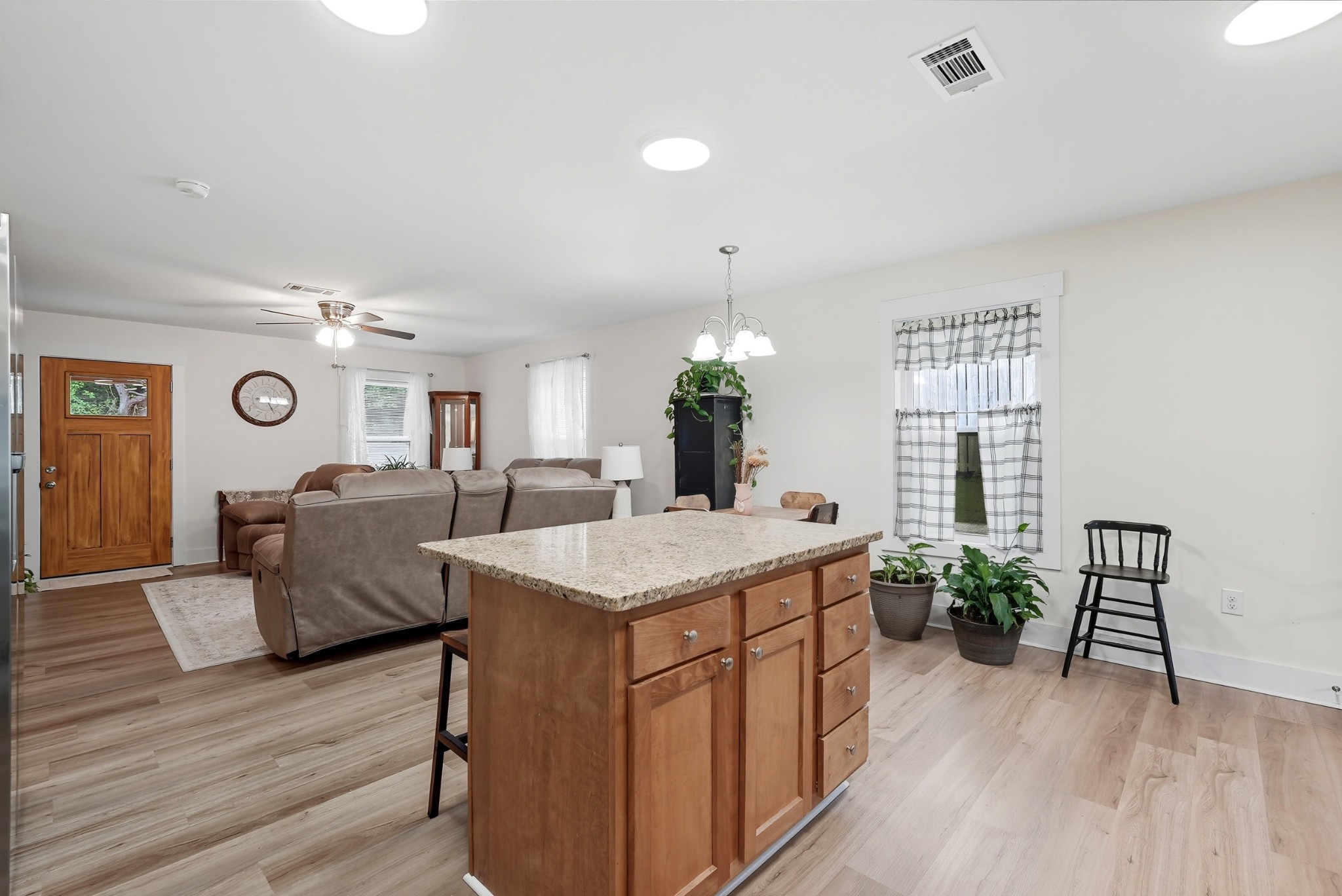 1215 Ennis Branch Road McEwen, TN 37101 - Photo 24 of 36 a living room with furniture and a wooden floor