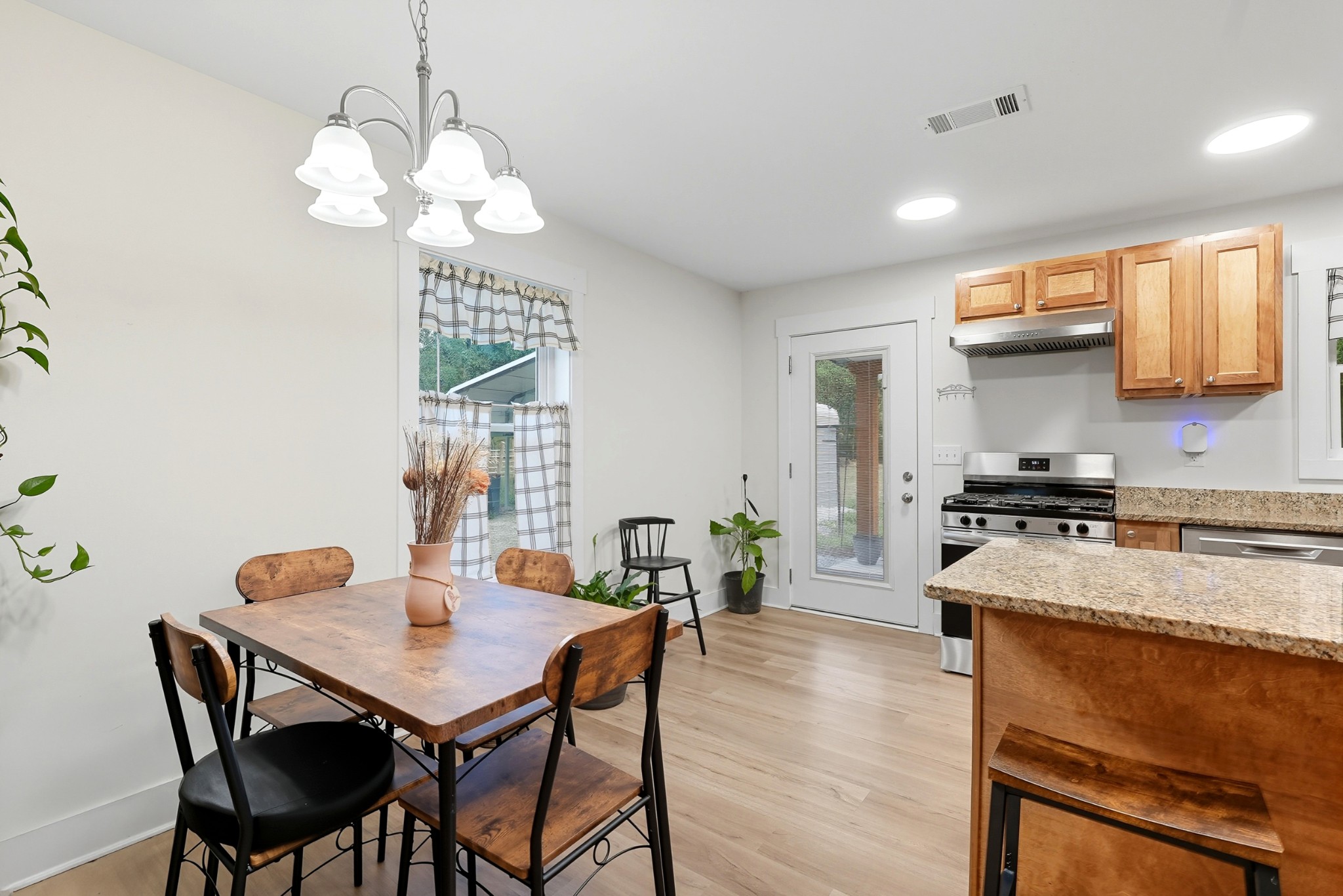 1215 Ennis Branch Road McEwen, TN 37101 - Photo 26 of 36 a view of a dining room with furniture window and wooden floor