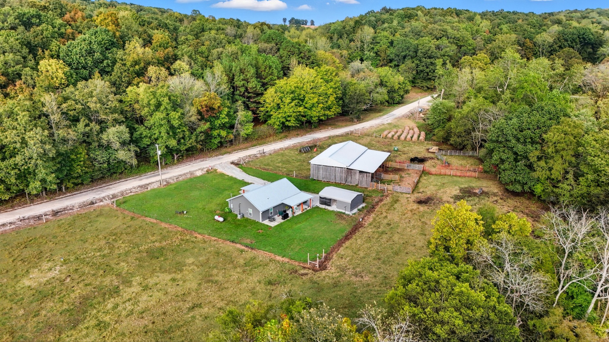 1215 Ennis Branch Road McEwen, TN 37101 - Photo 3 of 36 a view of a yard with table and chairs