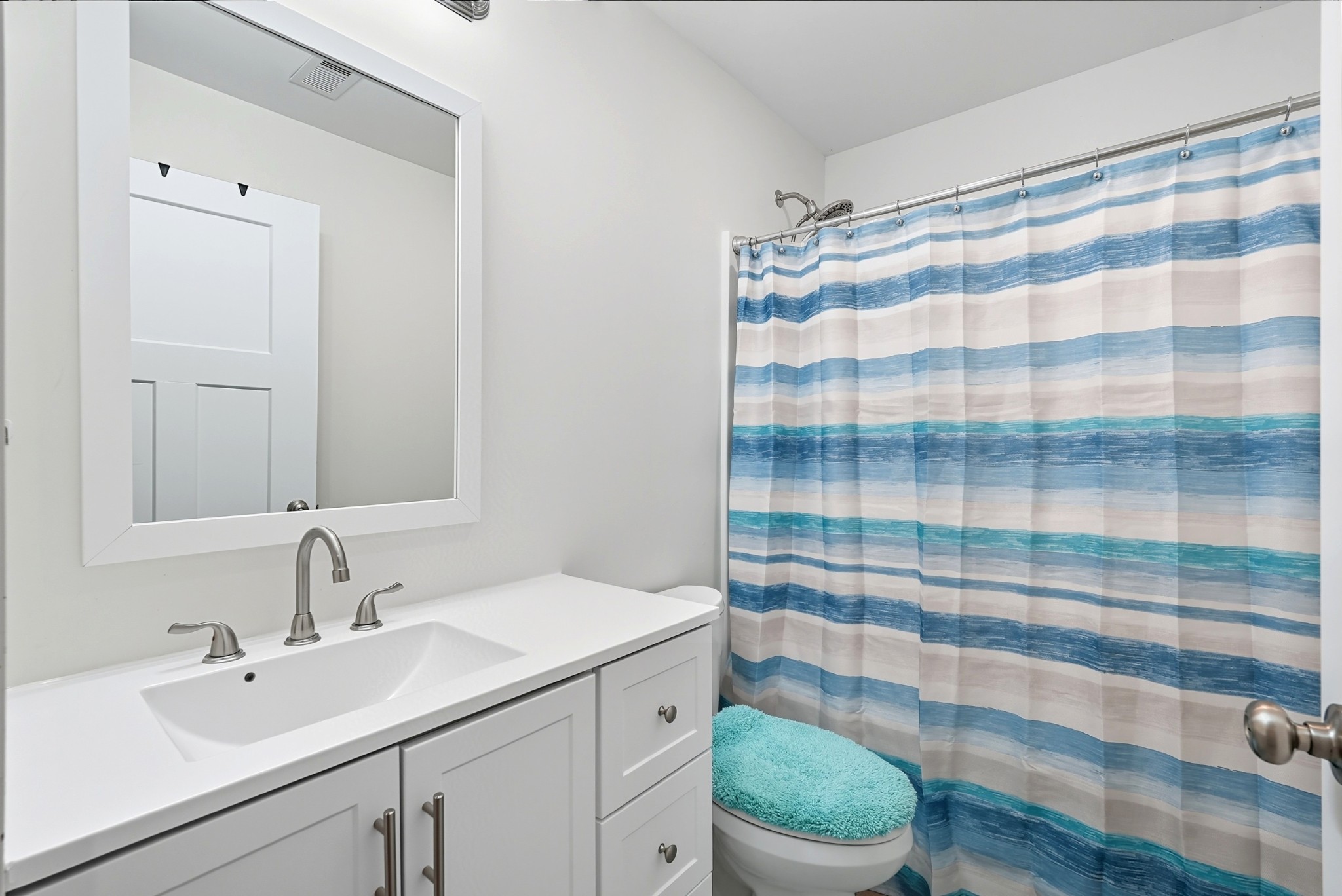 1215 Ennis Branch Road McEwen, TN 37101 - Photo 33 of 36 a bathroom with a sink and a mirror