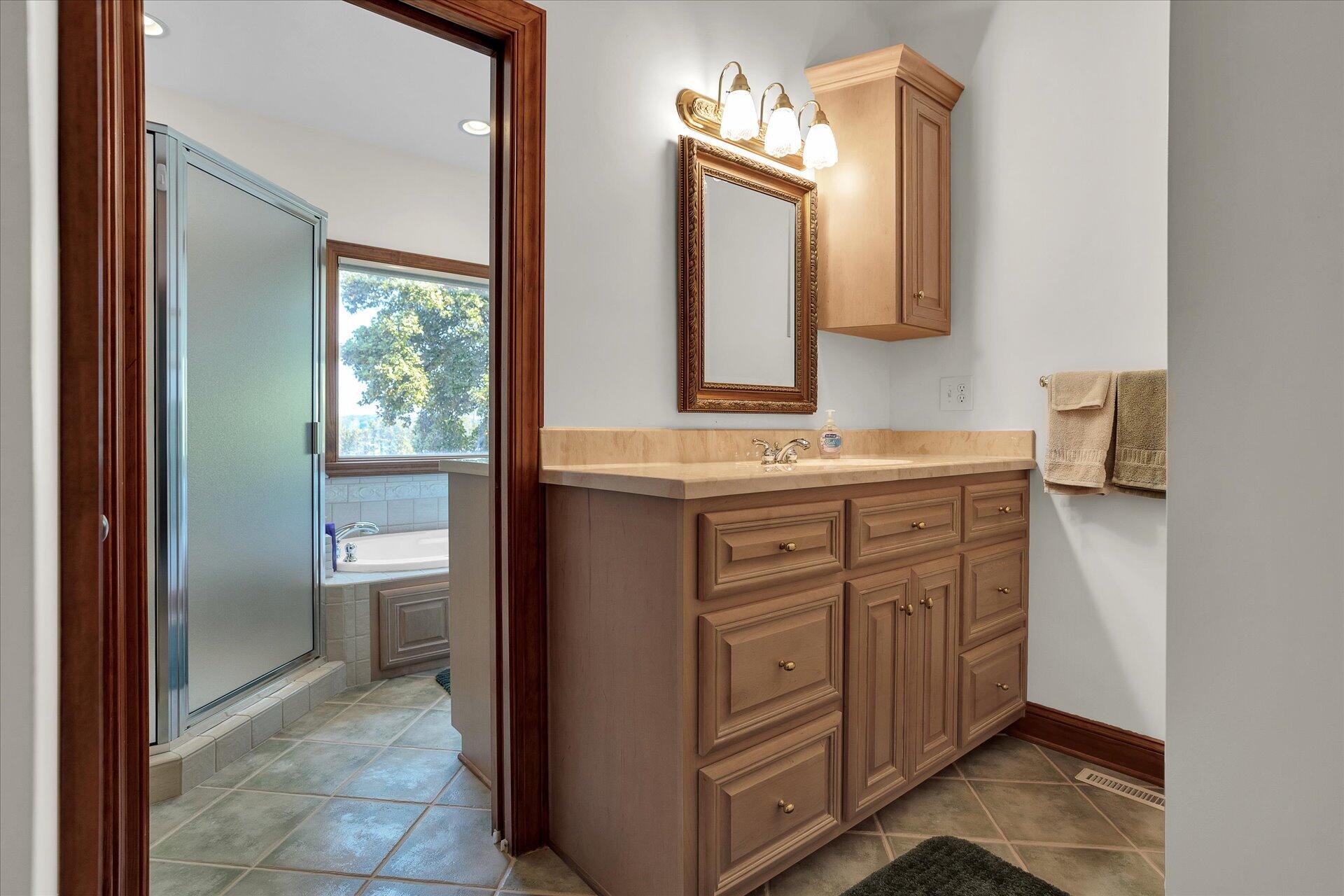 51 Spinnaker Drive Union Hall, VA 24176 - Photo 22 of 58 a bathroom with a sink and a mirror