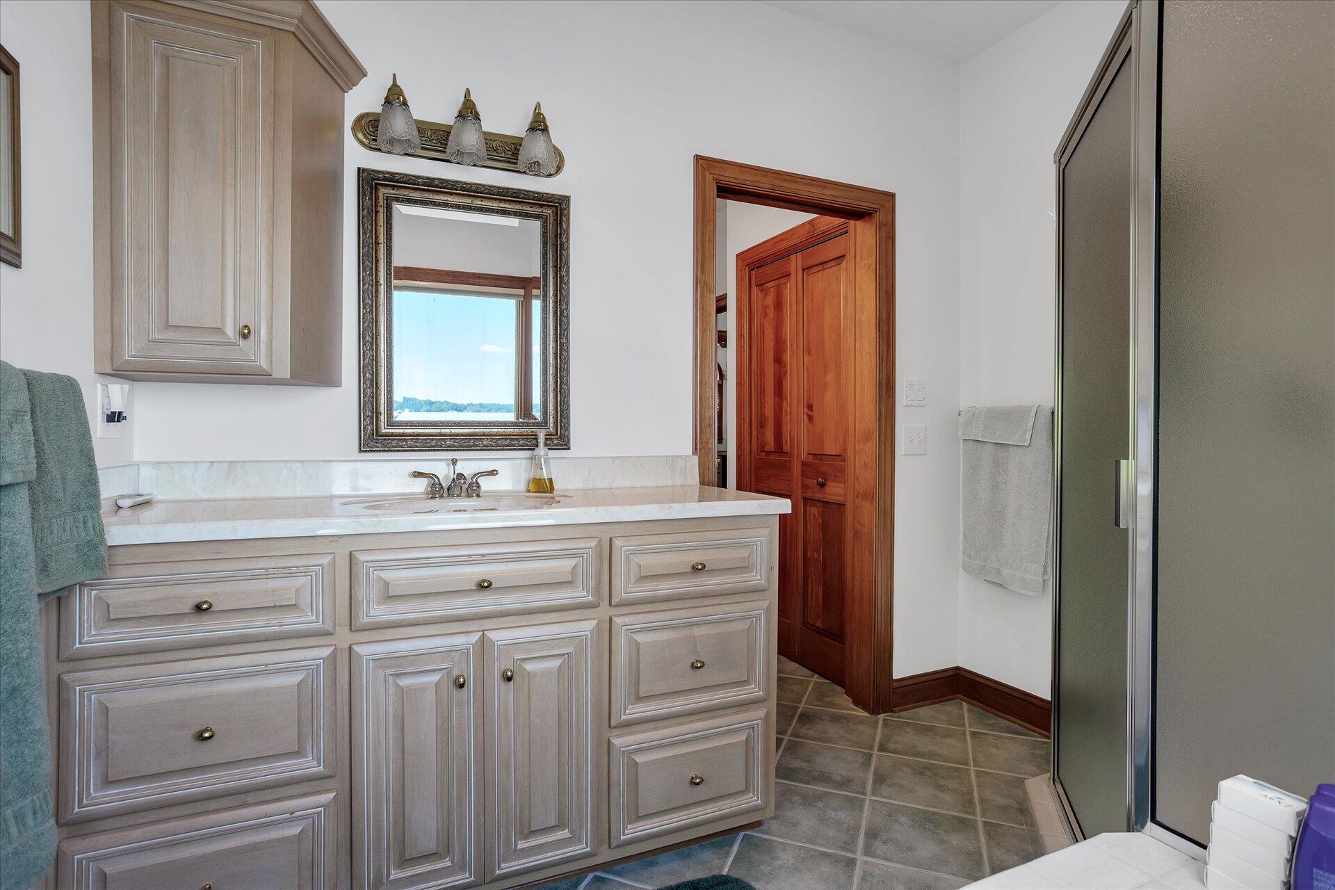 51 Spinnaker Drive Union Hall, VA 24176 - Photo 24 of 58 a bathroom with a sink a vanity and a mirror