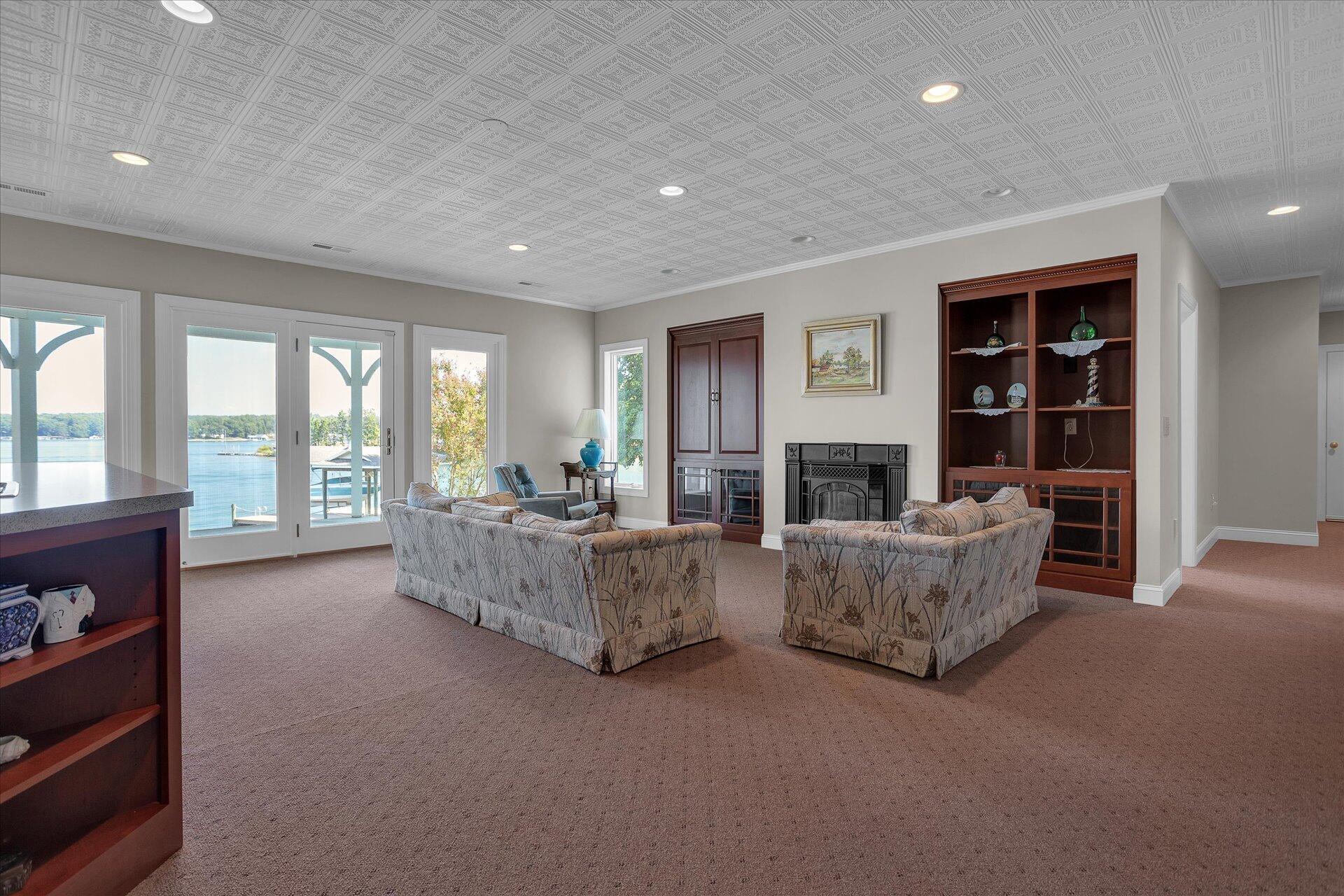 51 Spinnaker Drive Union Hall, VA 24176 - Photo 33 of 58 a living room with furniture and a fireplace