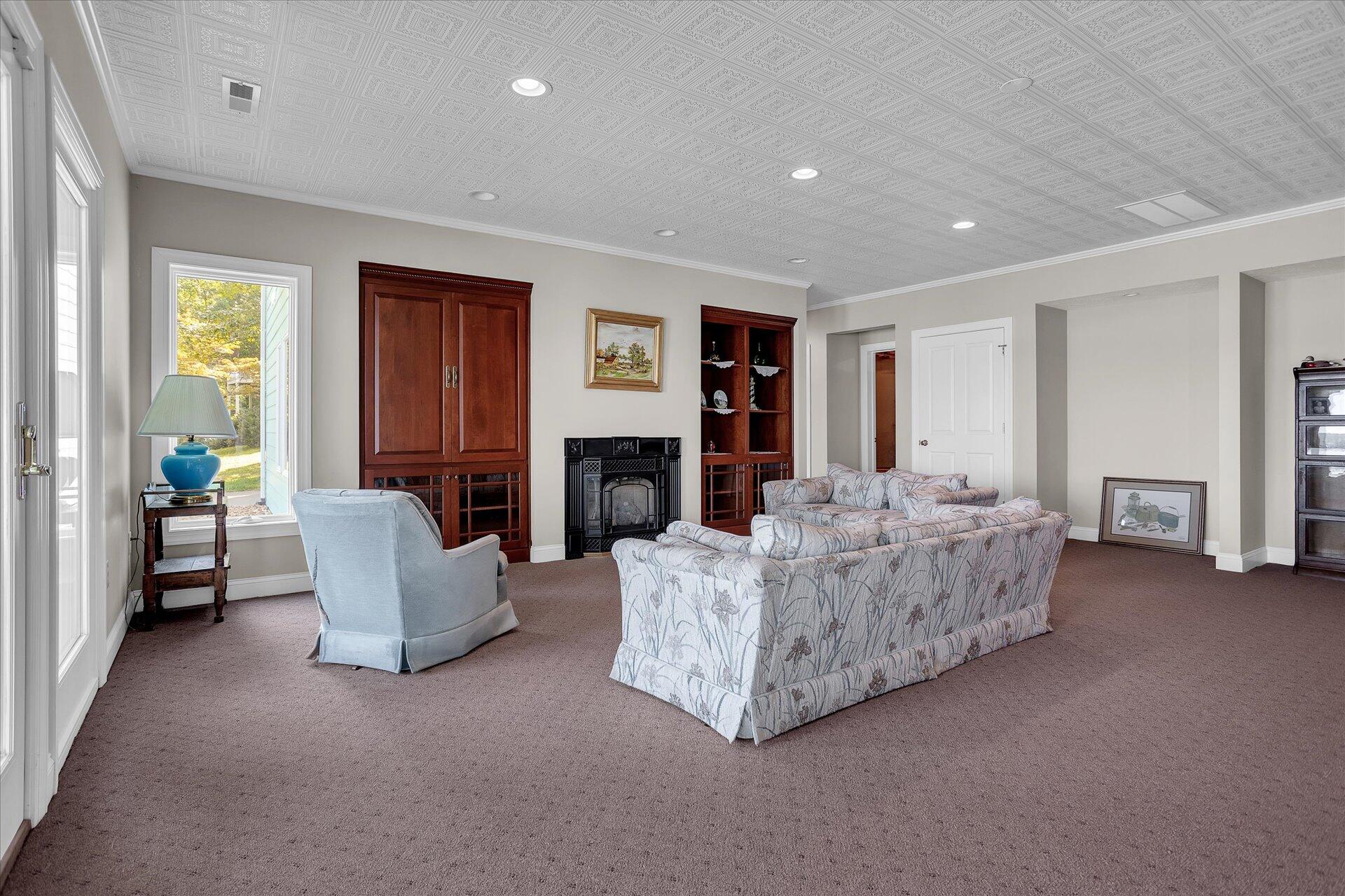 51 Spinnaker Drive Union Hall, VA 24176 - Photo 36 of 58 a living room with furniture and a fireplace