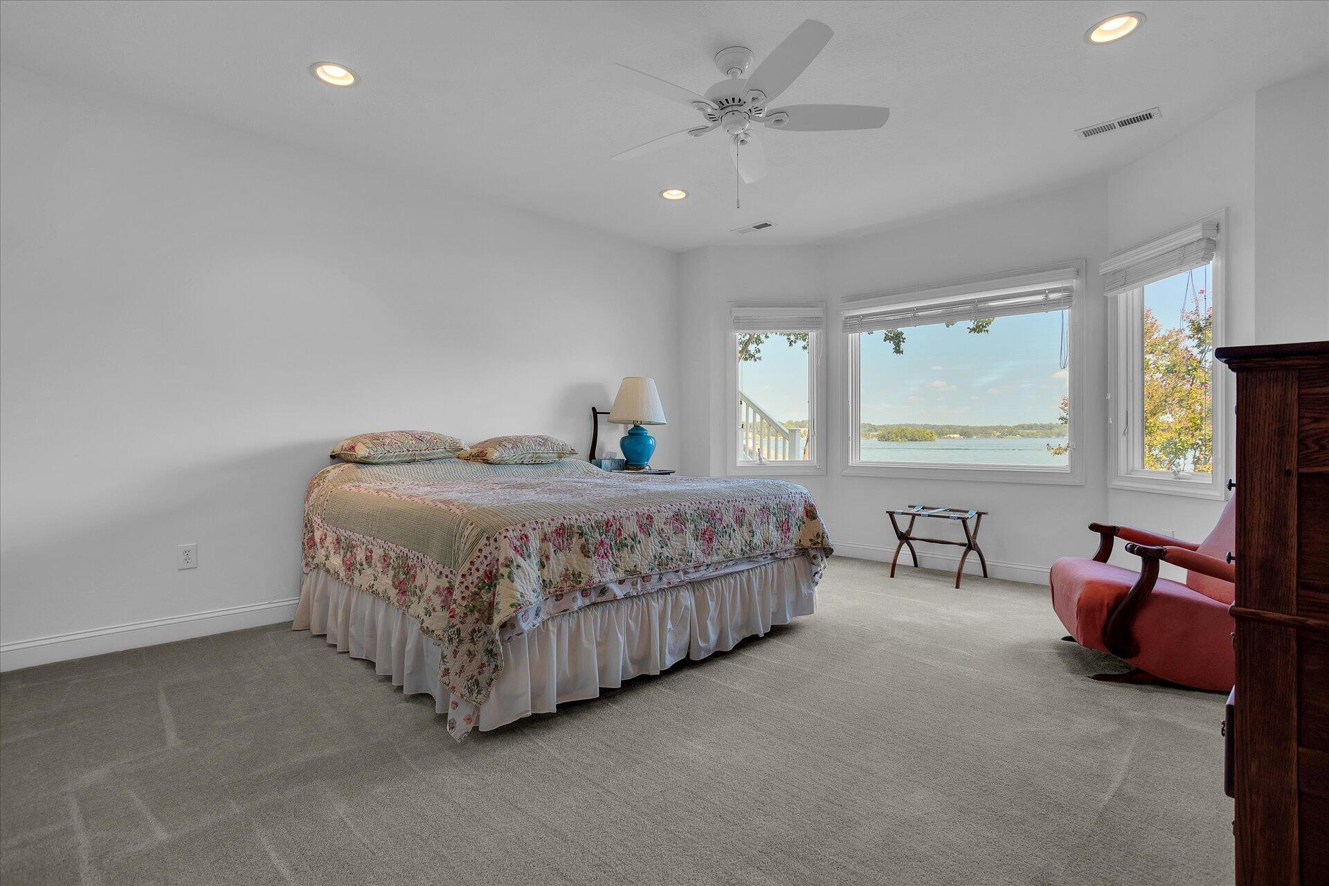 51 Spinnaker Drive Union Hall, VA 24176 - Photo 37 of 58 a bedroom with a bed a table and chair