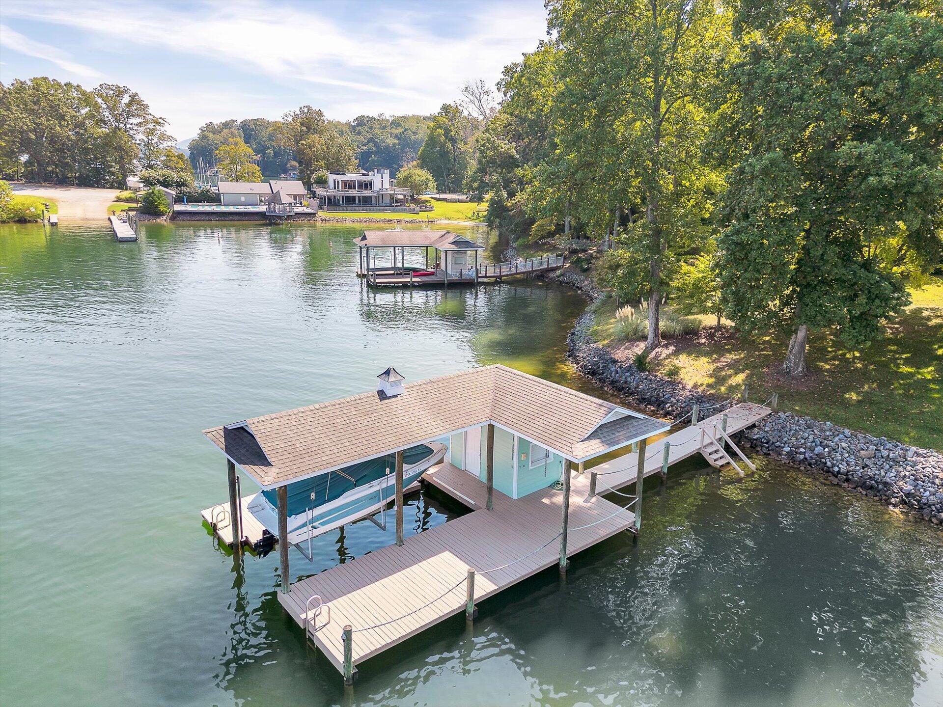 51 Spinnaker Drive Union Hall, VA 24176 - Photo 48 of 58 a view of a lake with house next to a lake