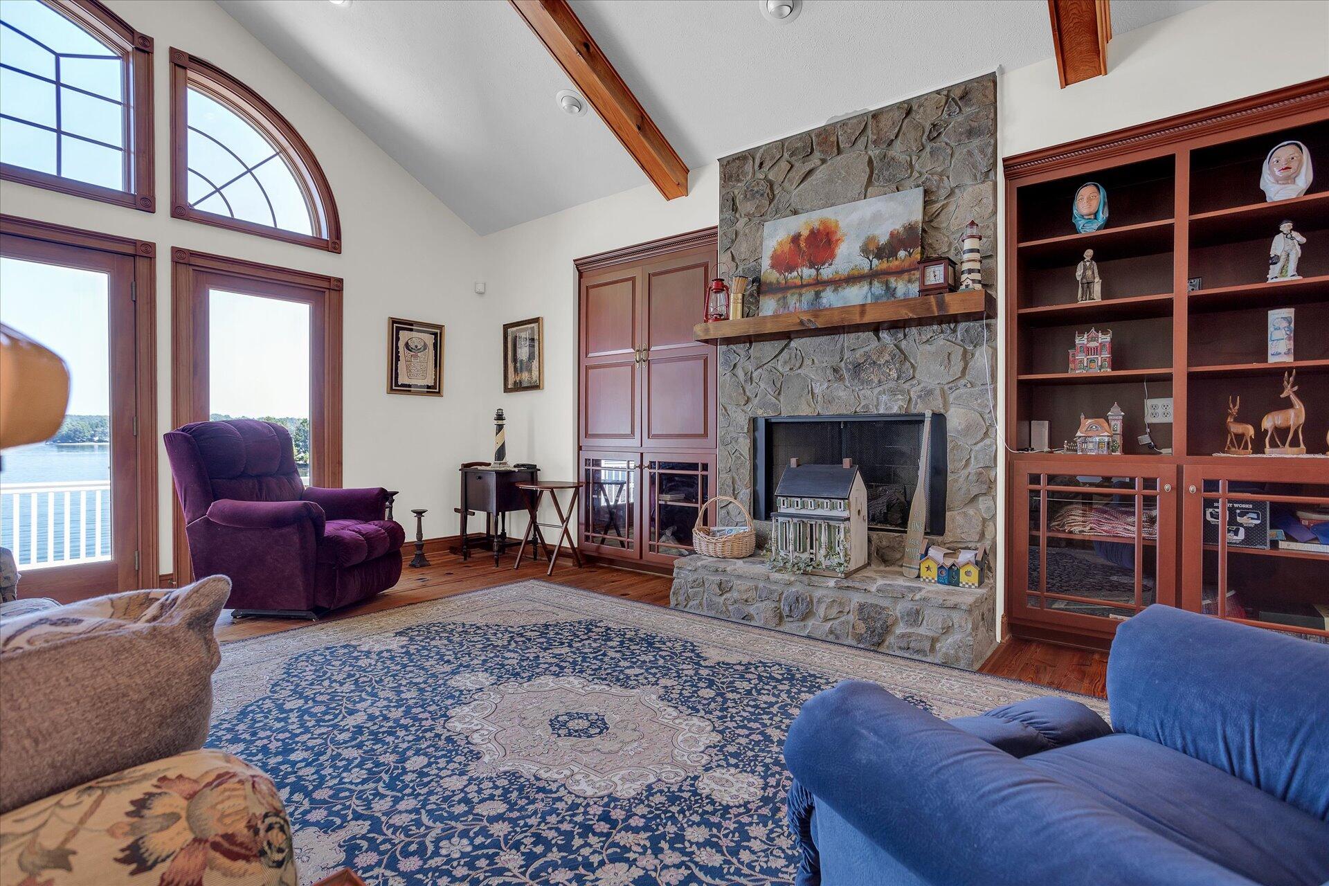 51 Spinnaker Drive Union Hall, VA 24176 - Photo 10 of 58 a living room with furniture and a fireplace