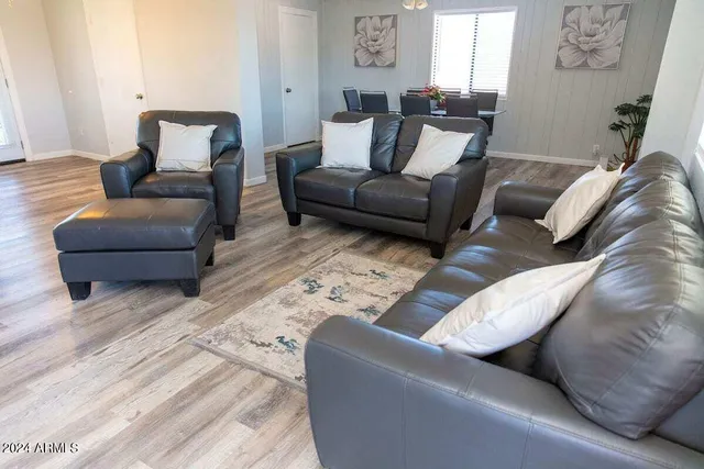 a living room with furniture and a couch