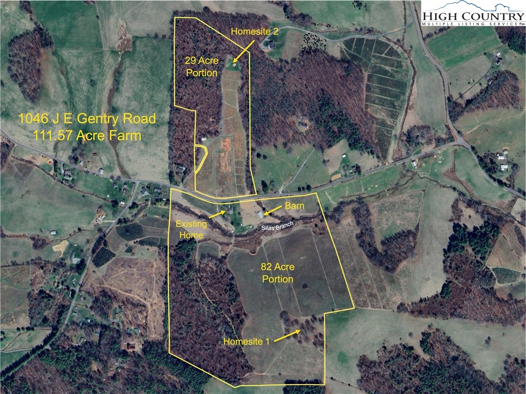 1046 J E Gentry Road Laurel Springs, NC 28644 - Photo 2 of 49 an aerial view of waterside residential house