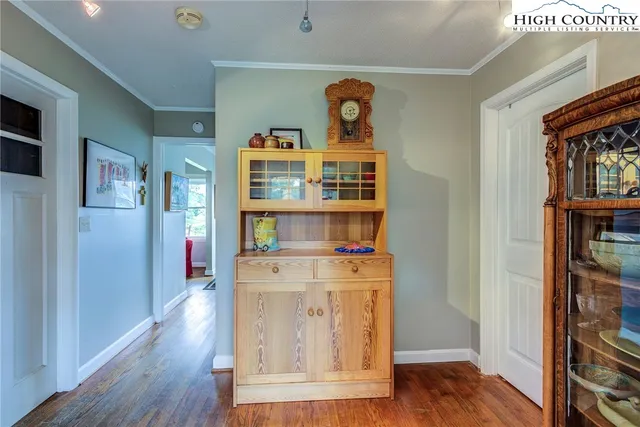 a bed room with a bed and a window