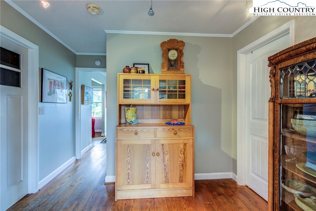 1046 J E Gentry Road Laurel Springs, NC 28644 - Photo 22 of 49 a view of a hallway with wooden floor and closet