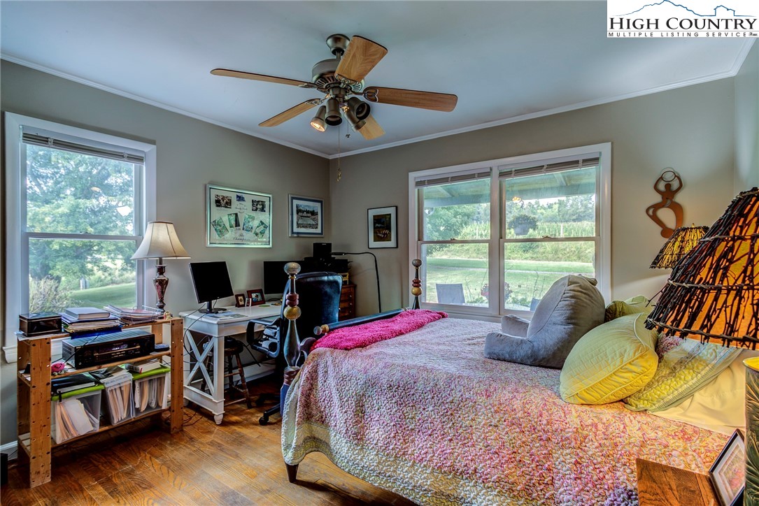 1046 J E Gentry Road Laurel Springs, NC 28644 - Photo 23 of 49 a bed room with a bed and a window