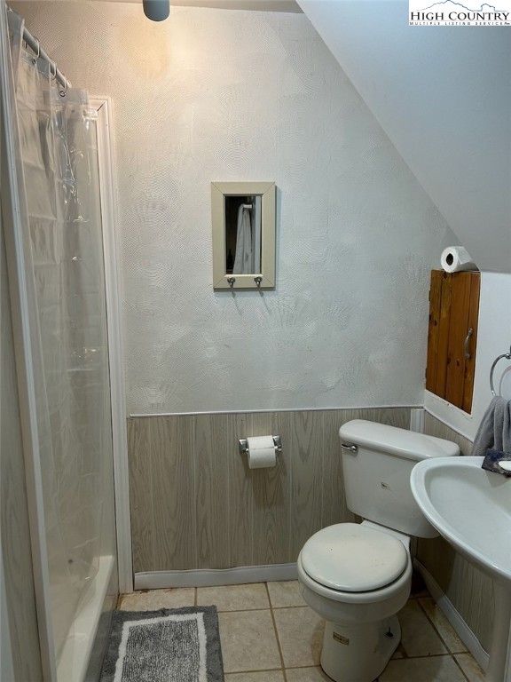 1046 J E Gentry Road Laurel Springs, NC 28644 - Photo 27 of 49 a bathroom with a toilet and a shower