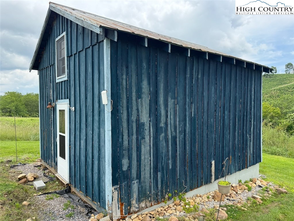 1046 J E Gentry Road Laurel Springs, NC 28644 - Photo 29 of 49 a view of backyard with potted plants