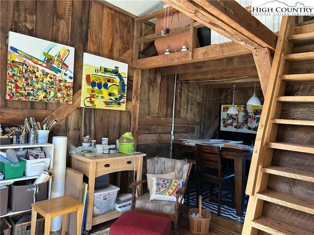 a room with furniture and wooden floor