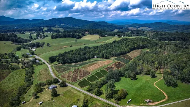 a view of a backyard with a patio