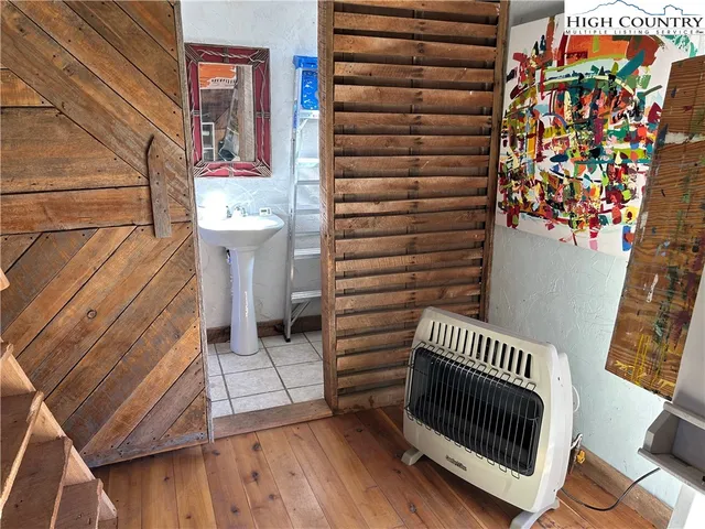a view of a house with potted plants