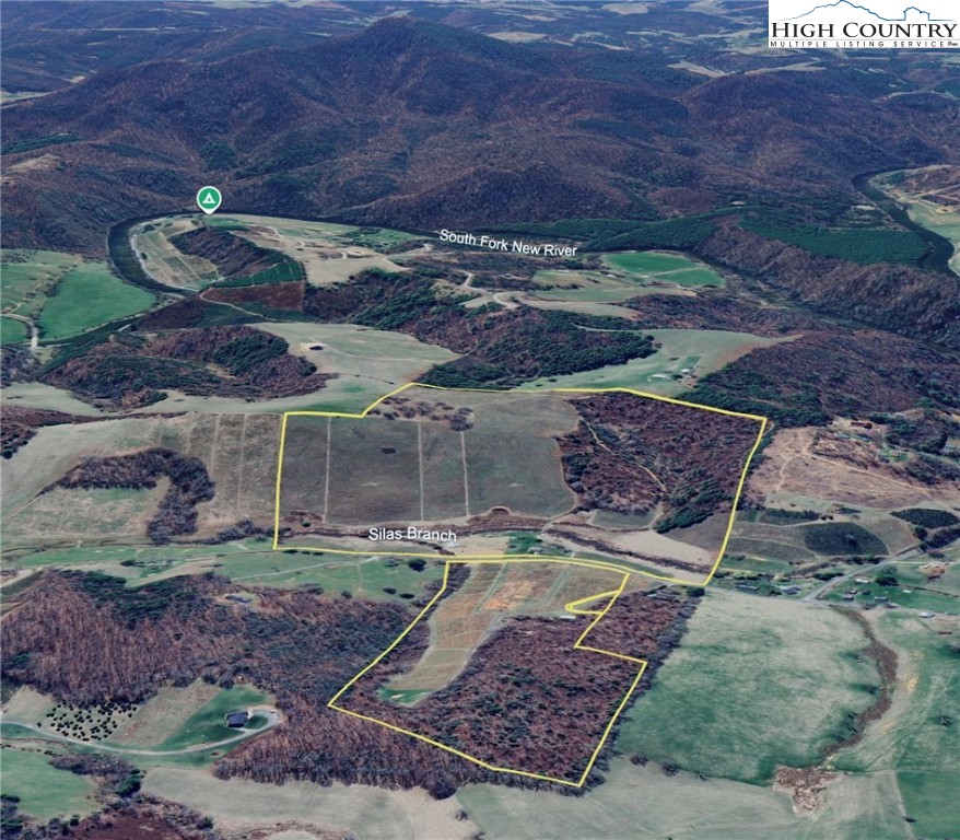 1046 J E Gentry Road Laurel Springs, NC 28644 - Photo 4 of 49 a view of a backyard with a patio